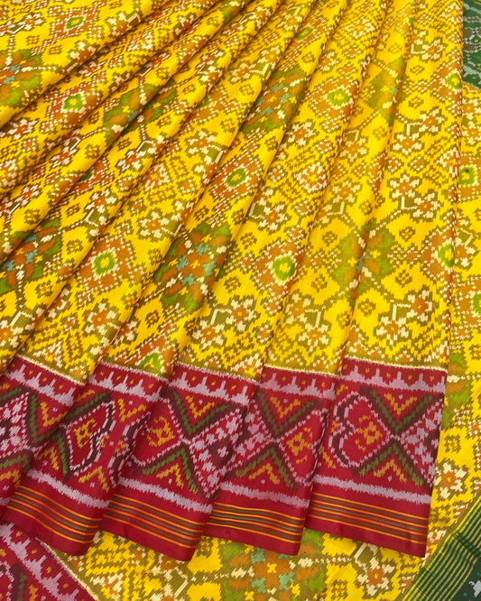 Yellow Ganga Jamuna Navratan Patola Saree
