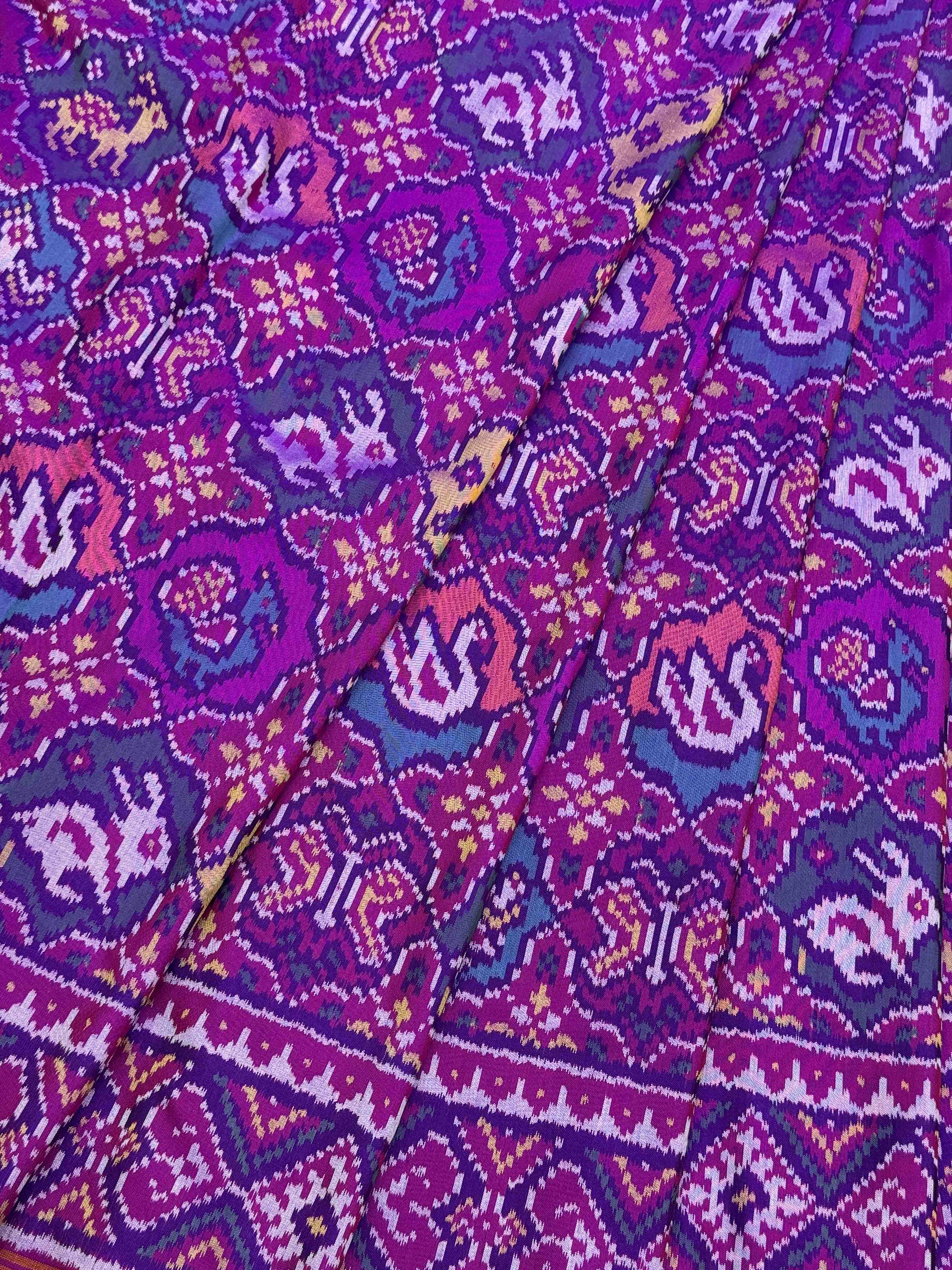 Purple with multi figures Patola saree