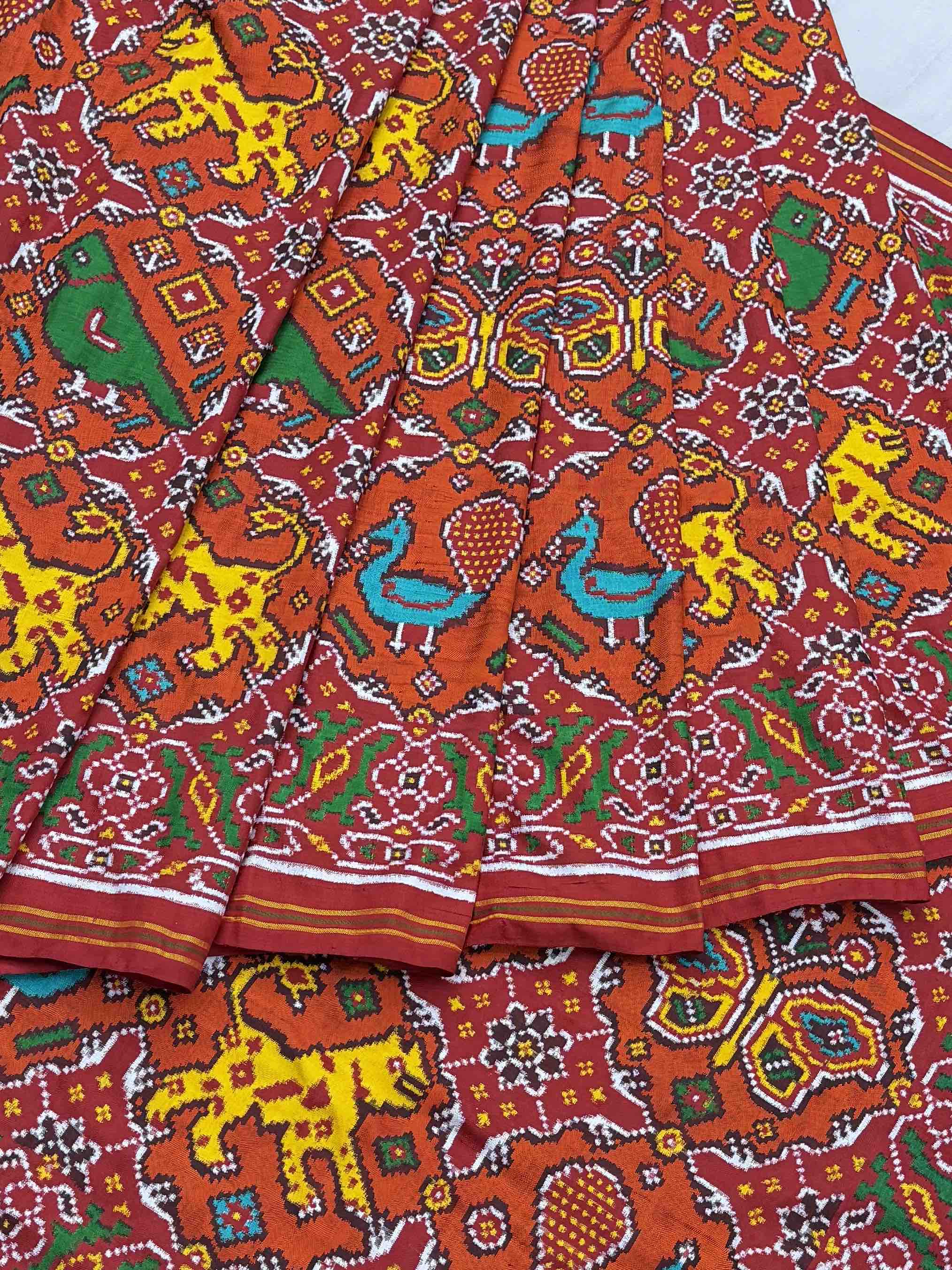 Red and orange big figures in circle Patan Patola Saree