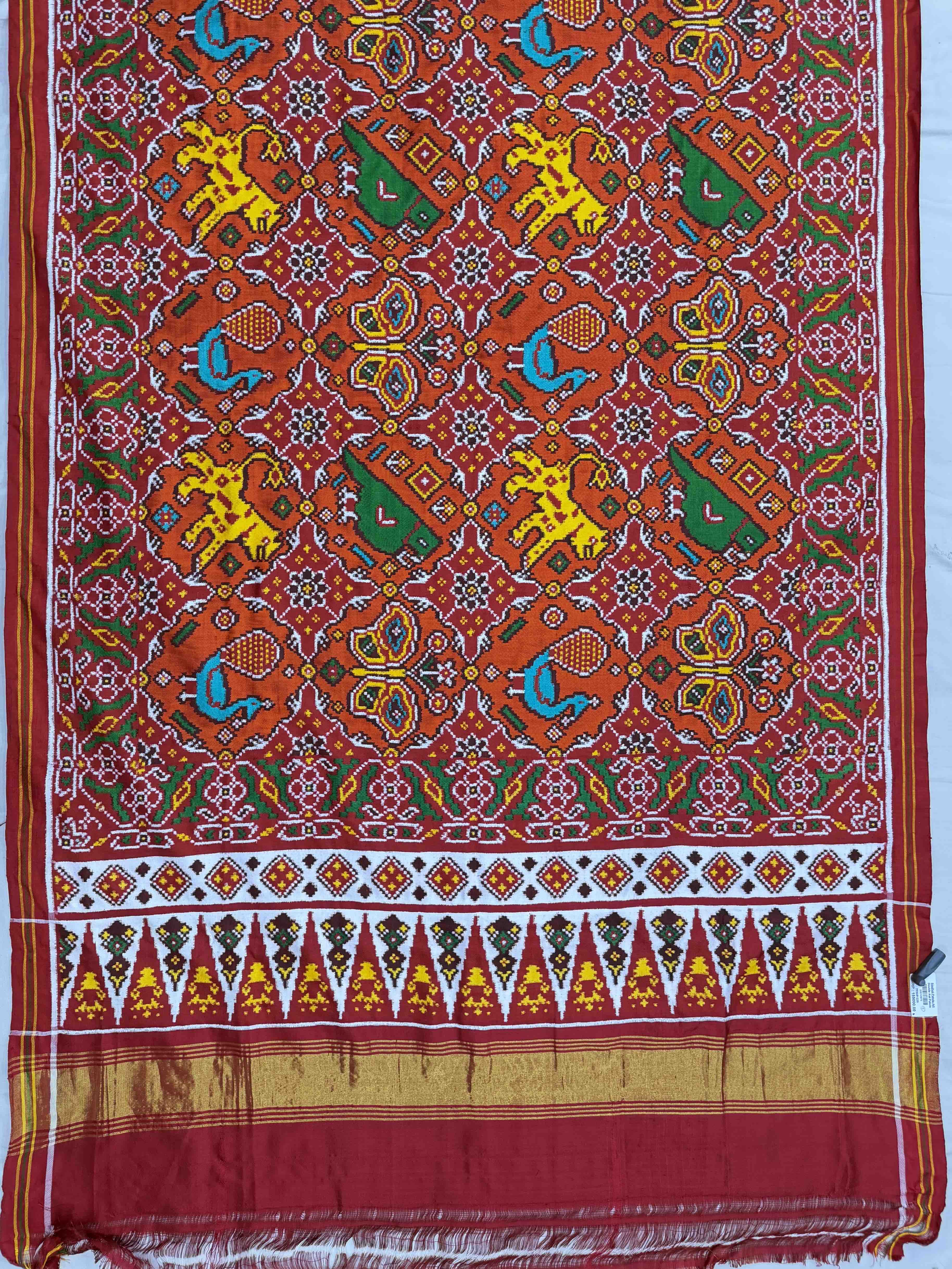 Red and orange big figures in circle Patan Patola Saree
