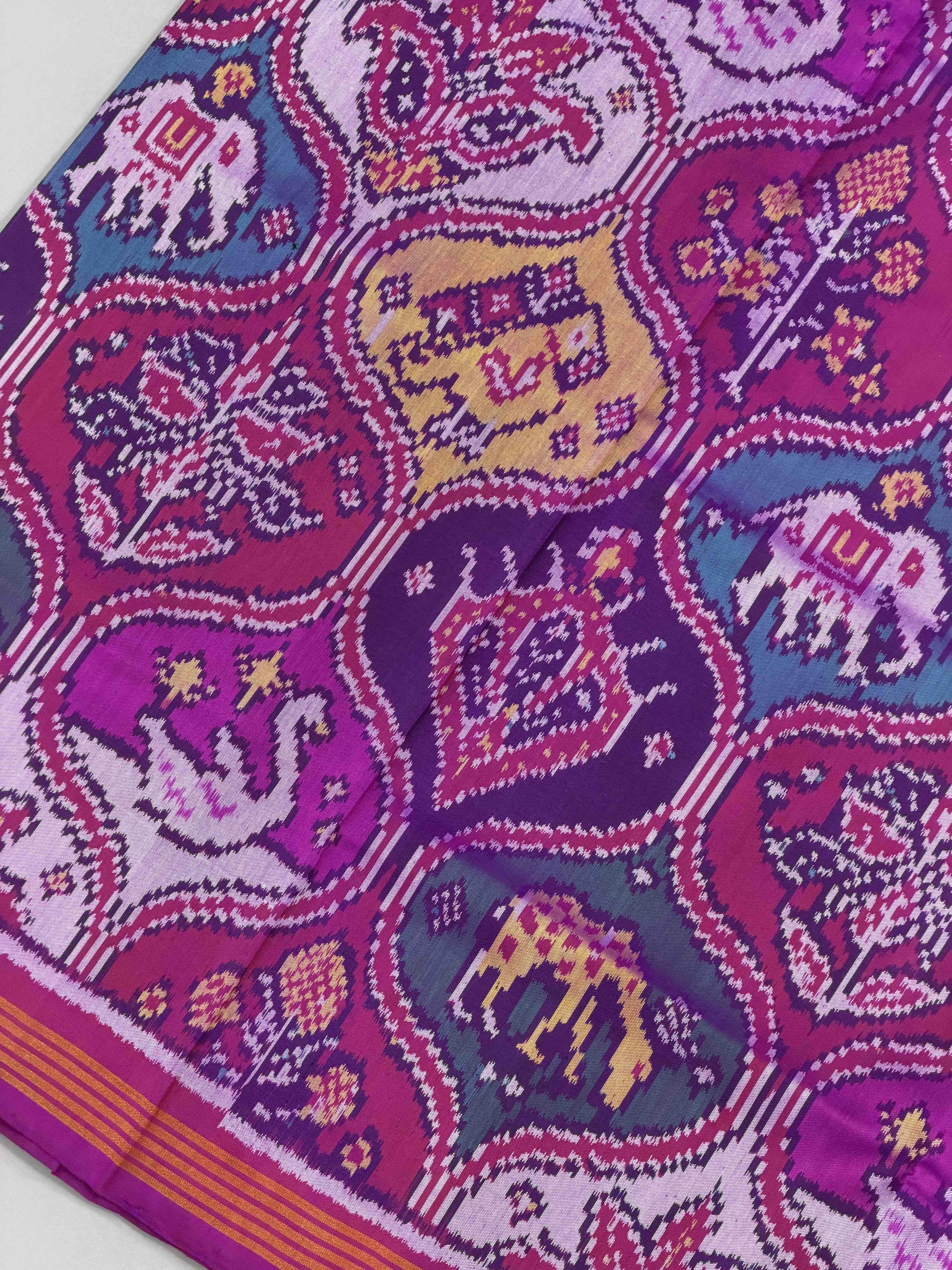 Magenta with multiple figures Patola Saree