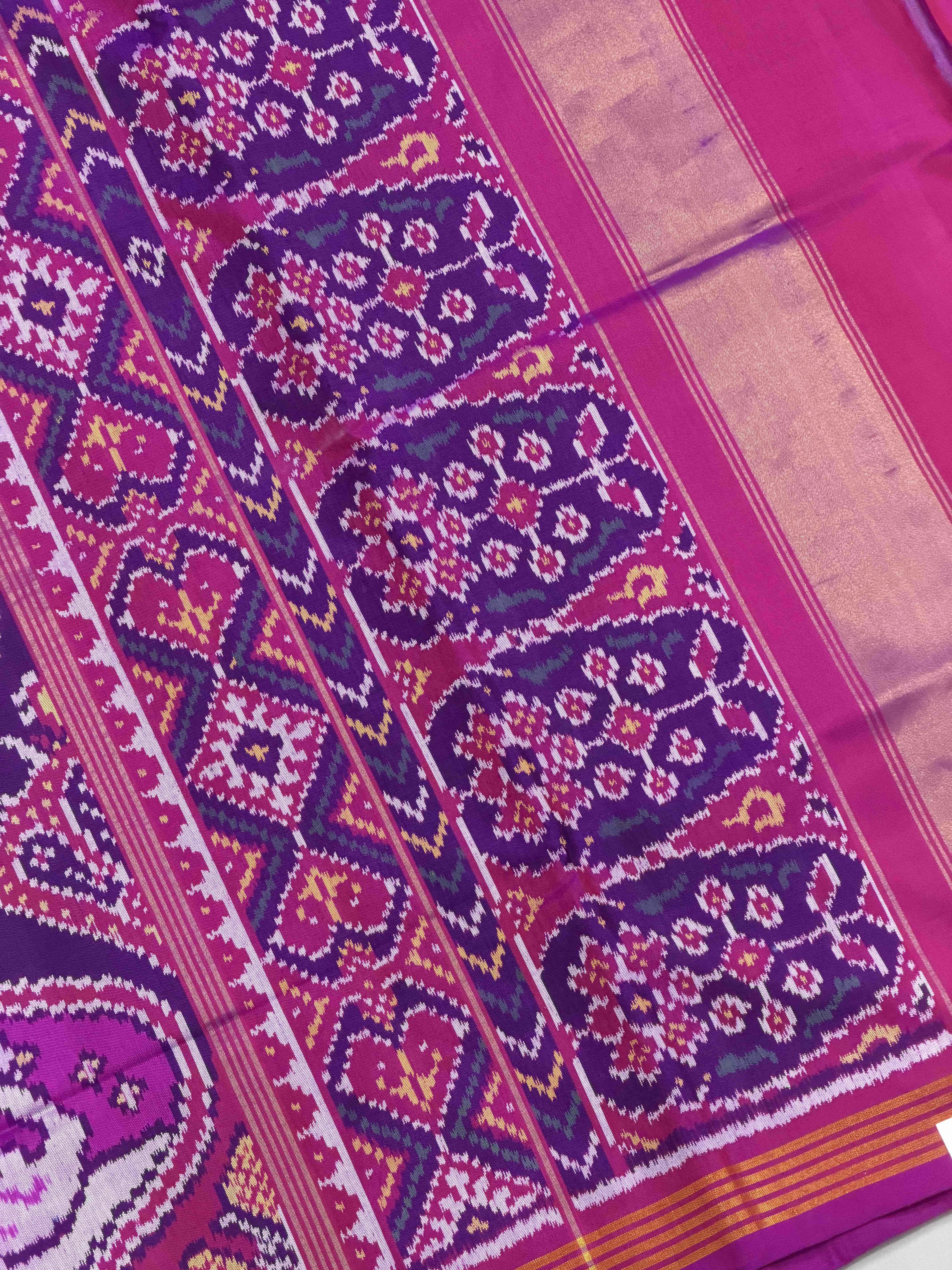 Magenta with multiple figures Patola Saree