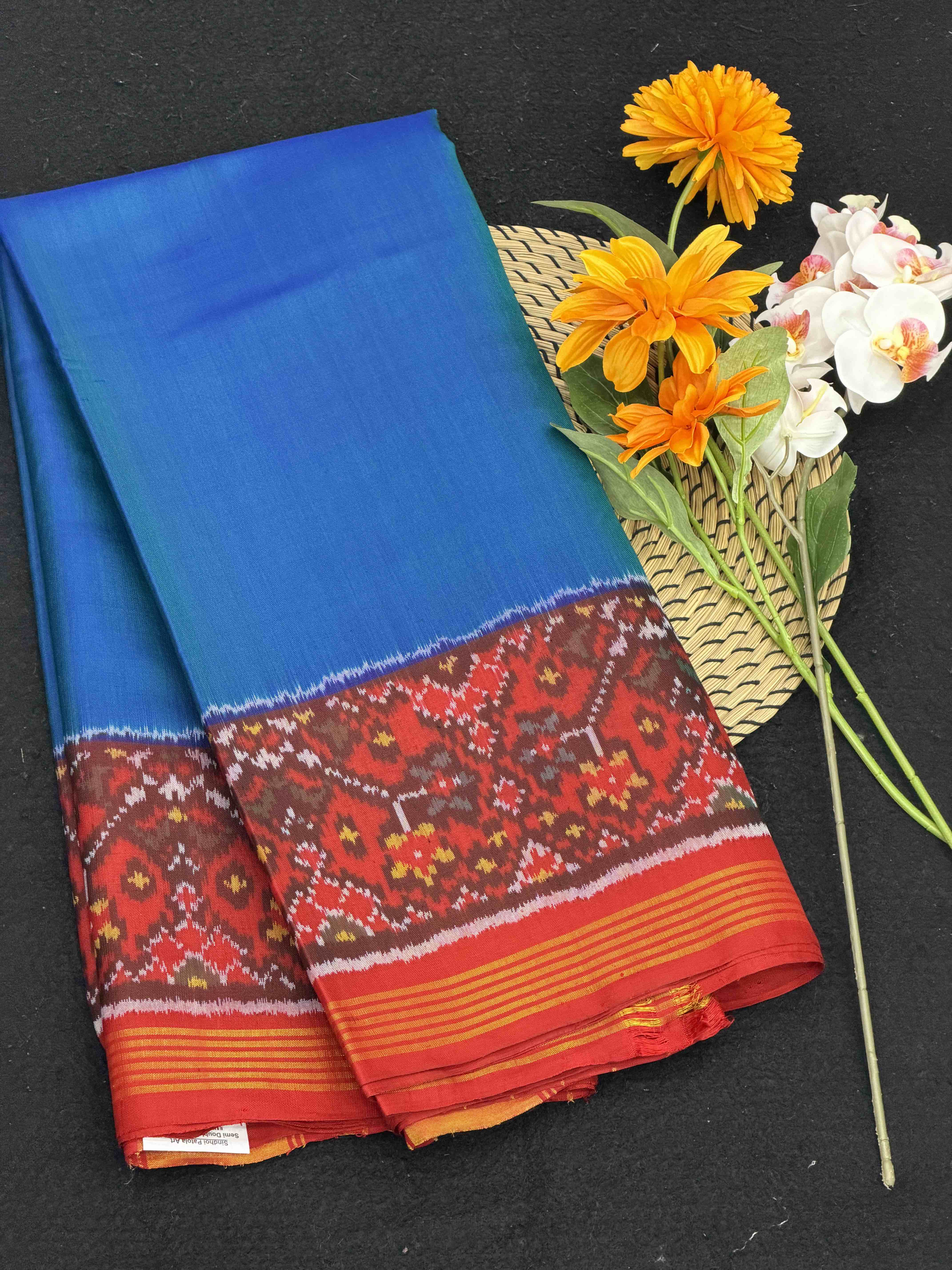 Red navratan pallu peacock blue plain body