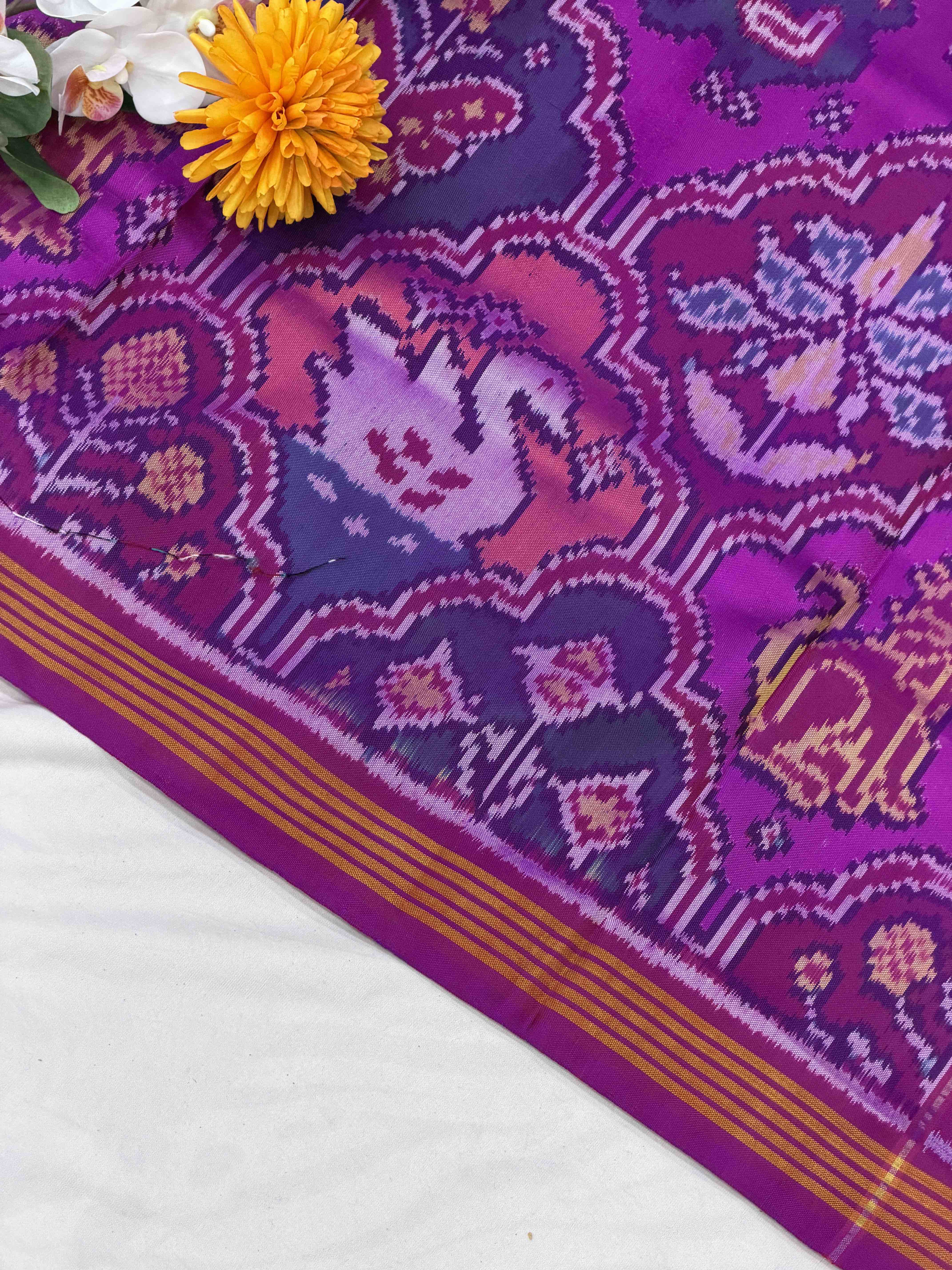 Magenta pink multiple motif figure Patola Saree