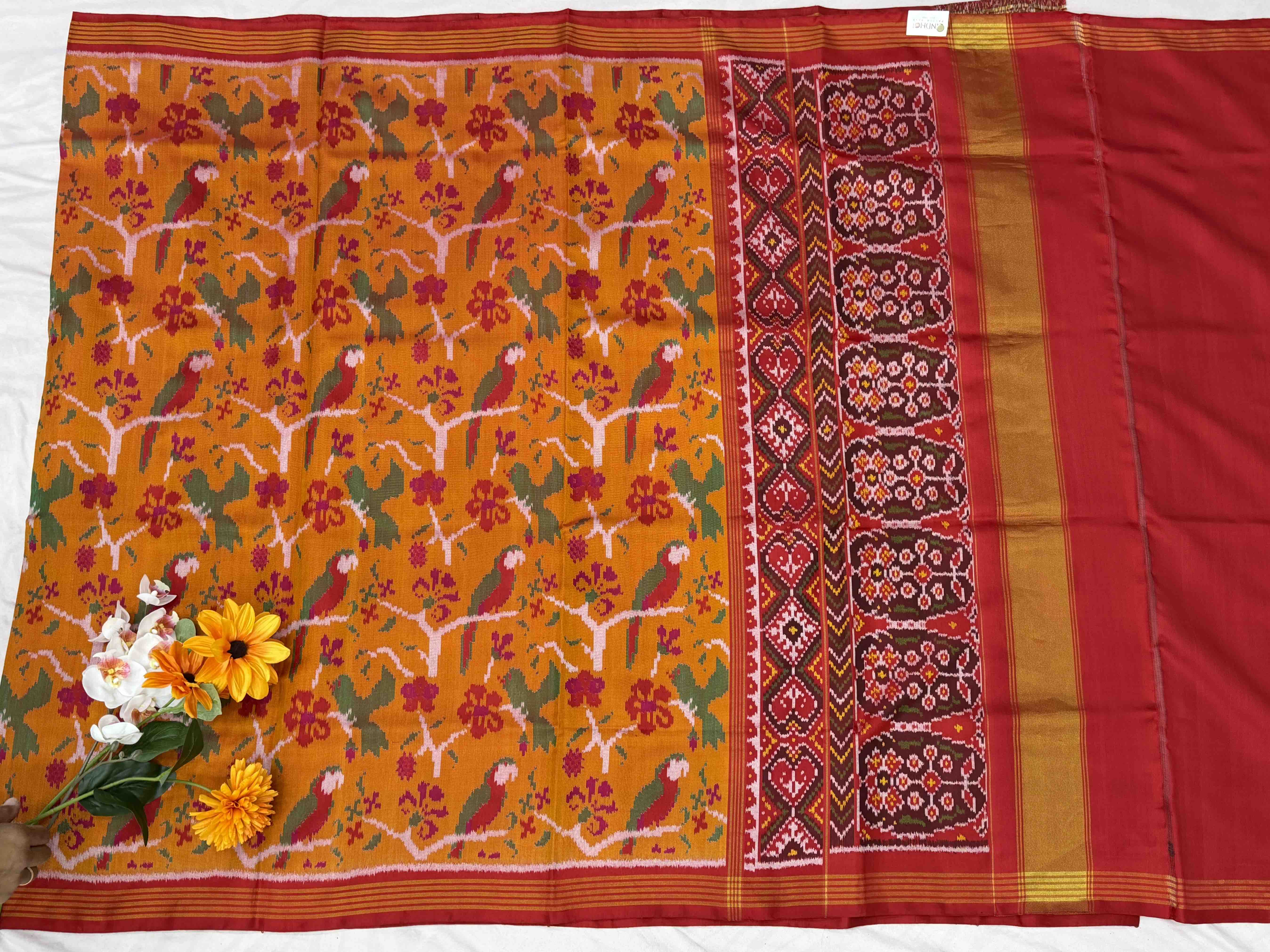 Red & rust orange parrot figure Patola saree