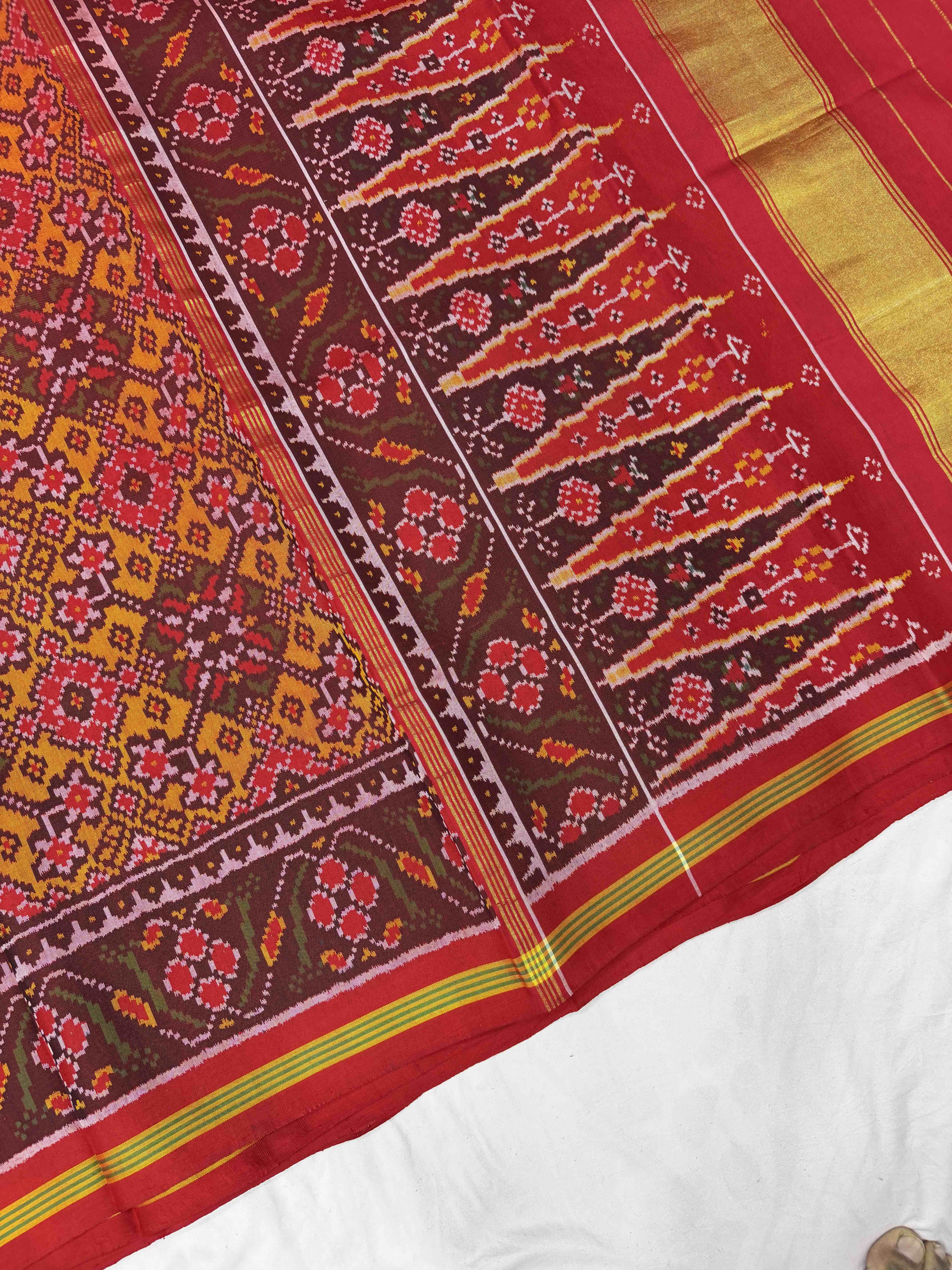 Maroon & musterd Navaratan Patola saree