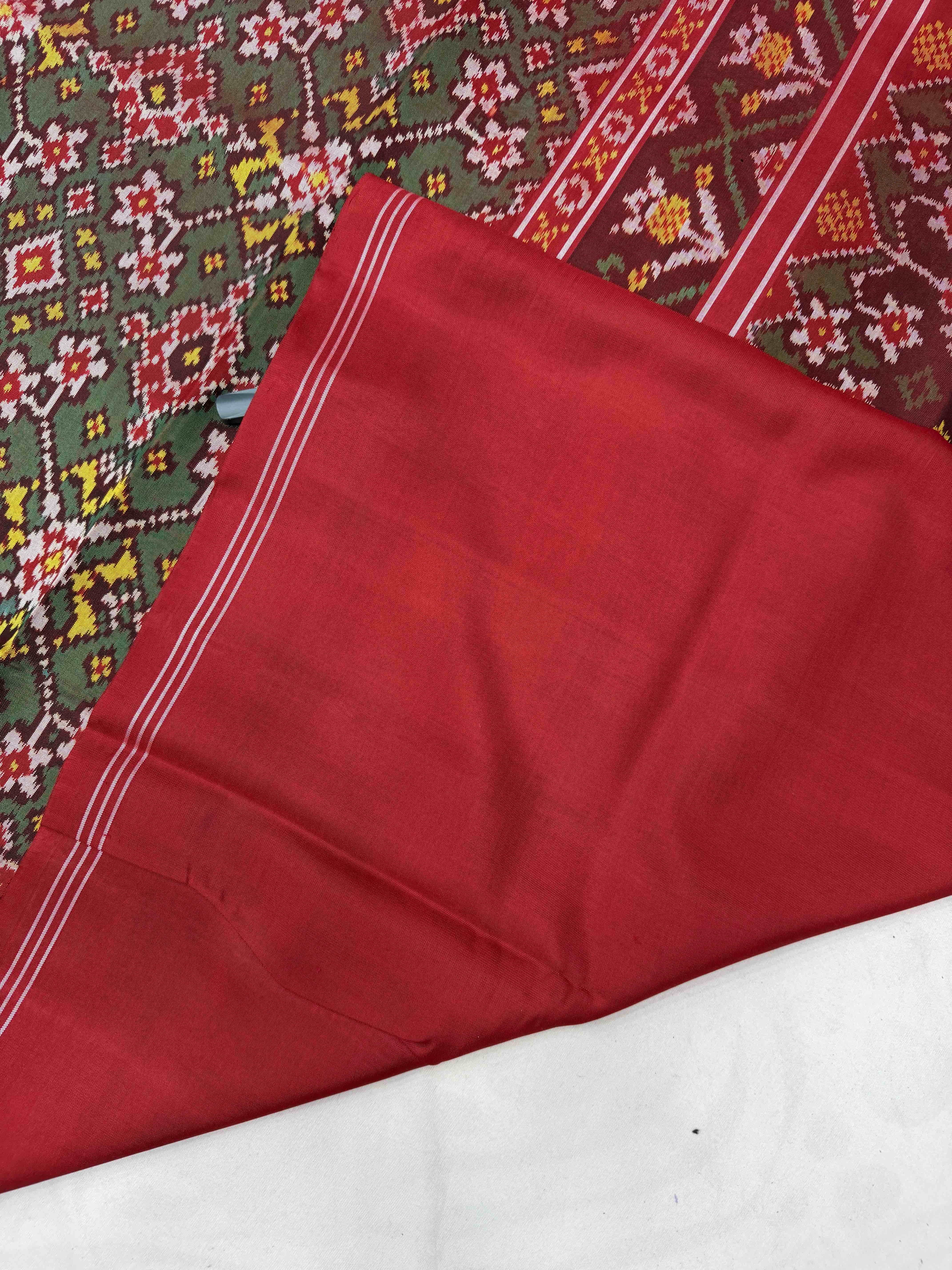 Red & shaded green Navaratan Patola Saree