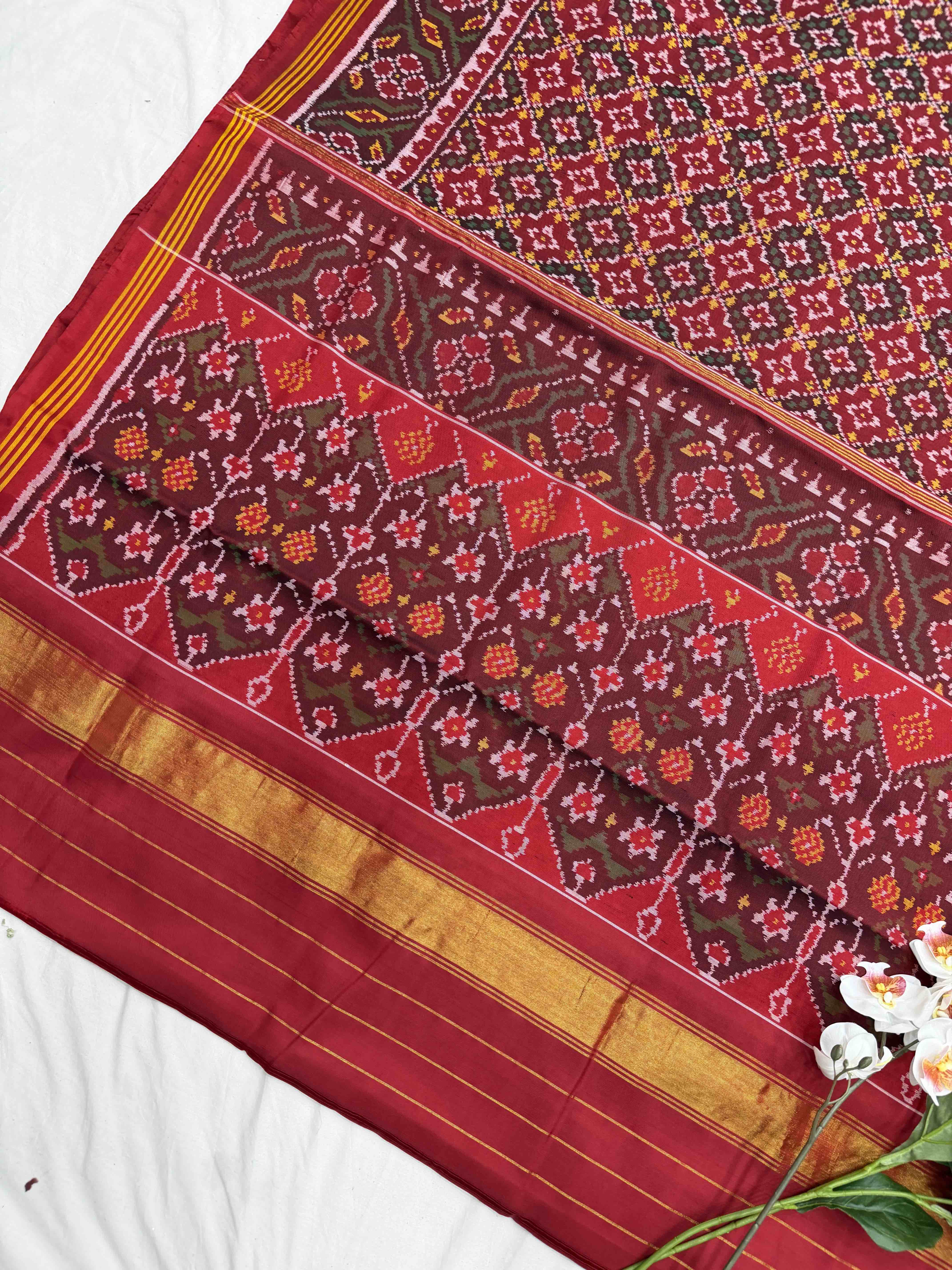 Maroon Red Buttonful Patola Saree
