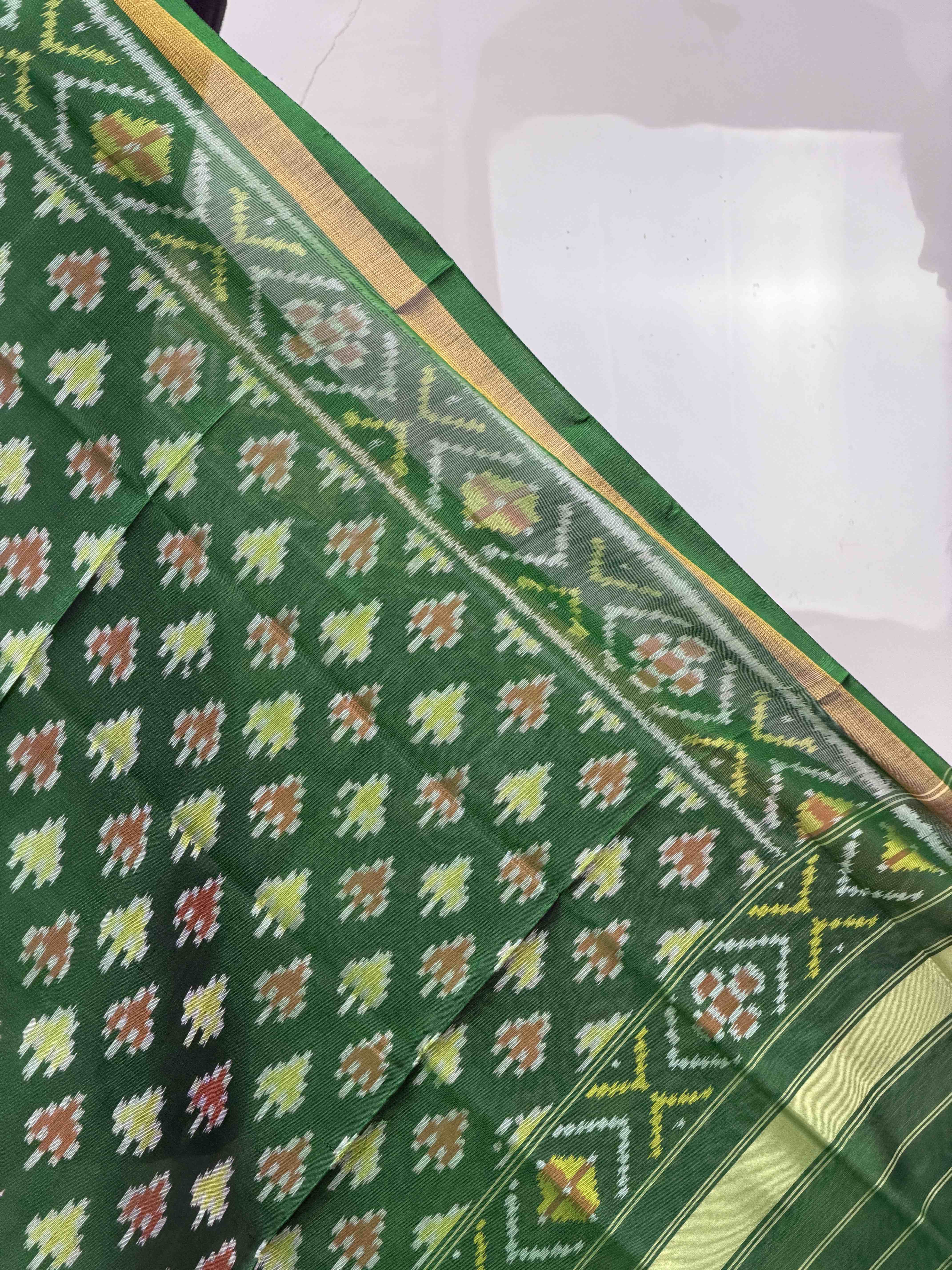Small dupatta in green shade woven in single ikat