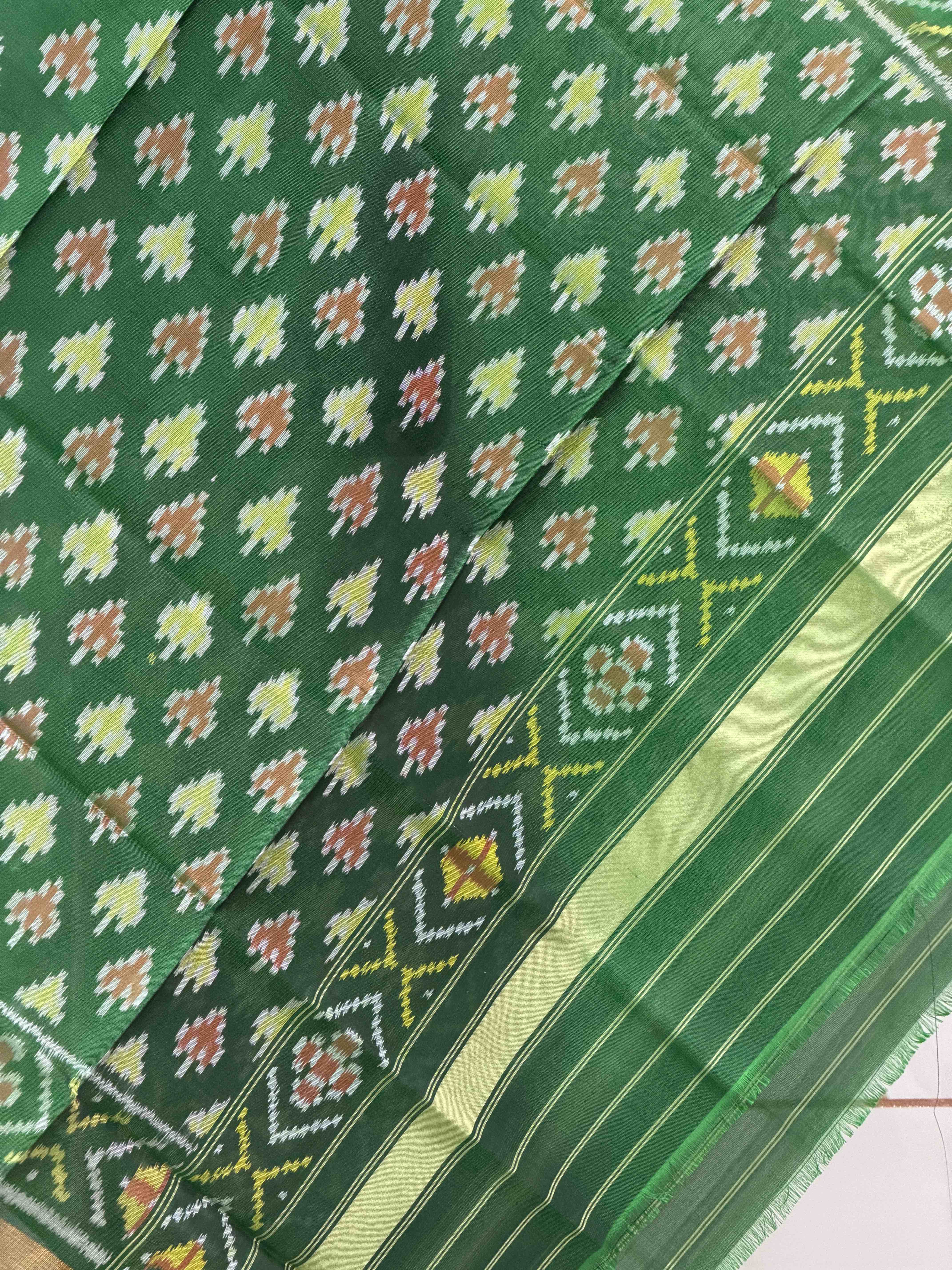 Small dupatta in green shade woven in single ikat