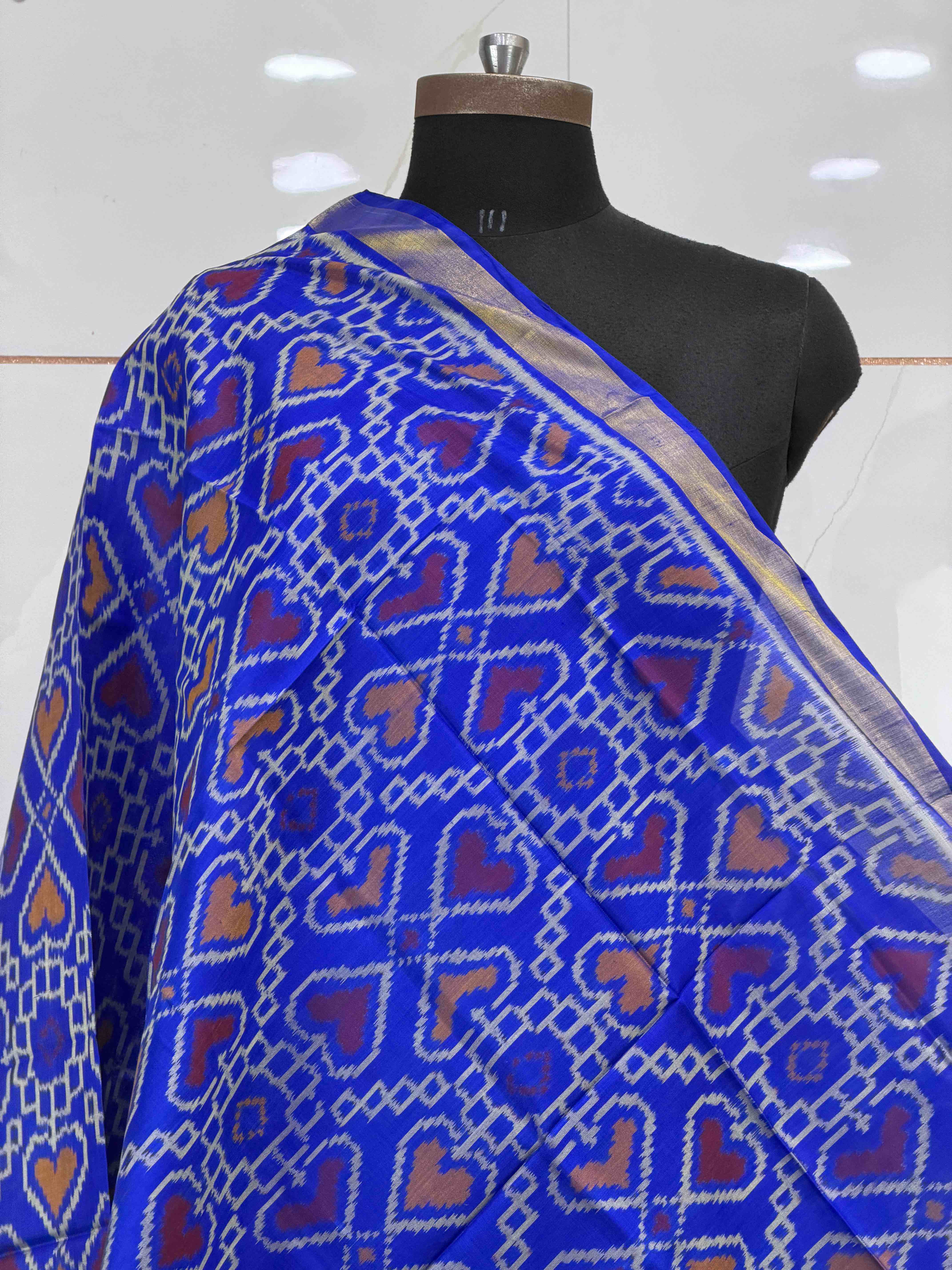 Small dupatta in blue shade in manekchawk pattern woven in single ikat