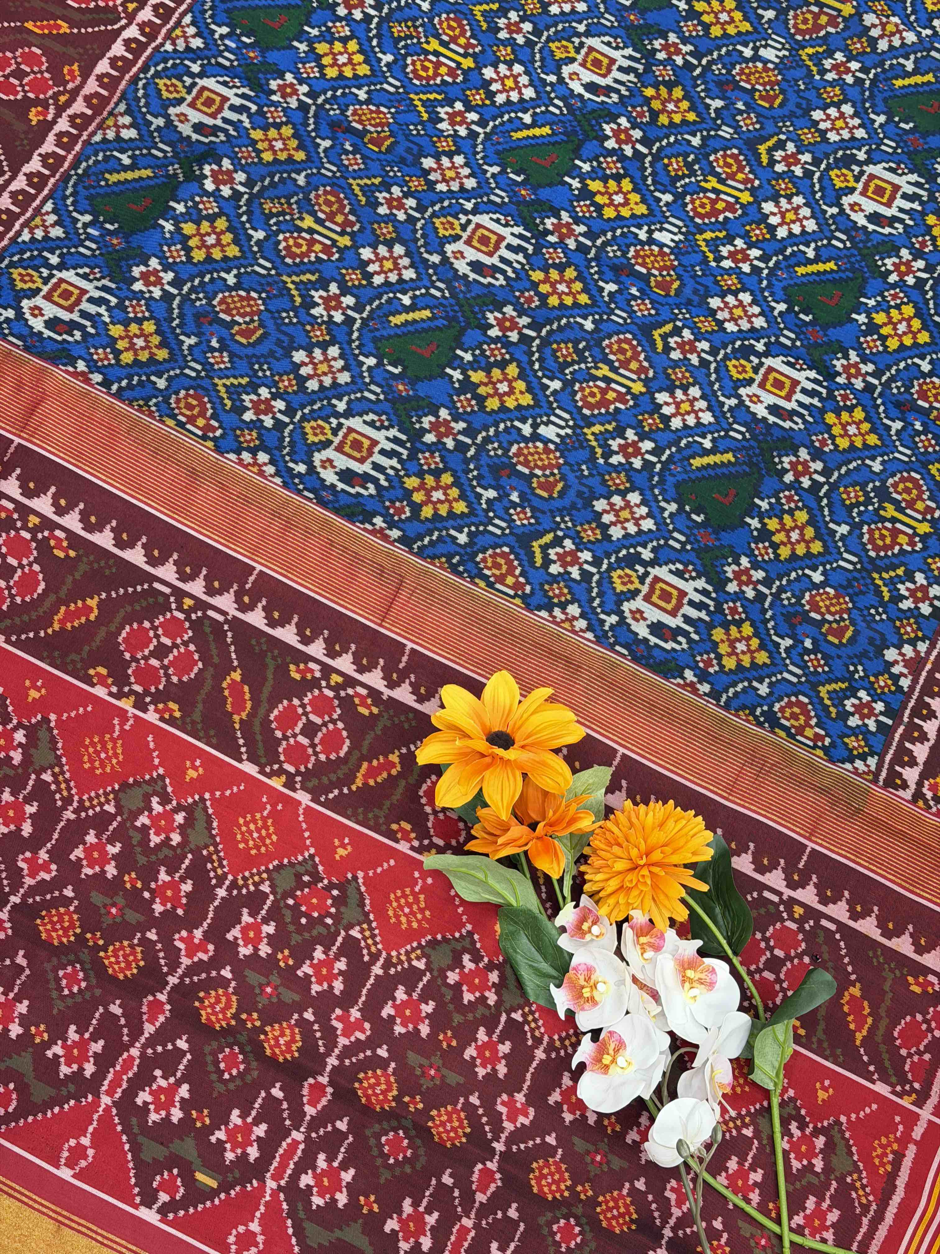 Maroon & Blue floral figure single ikat Patola