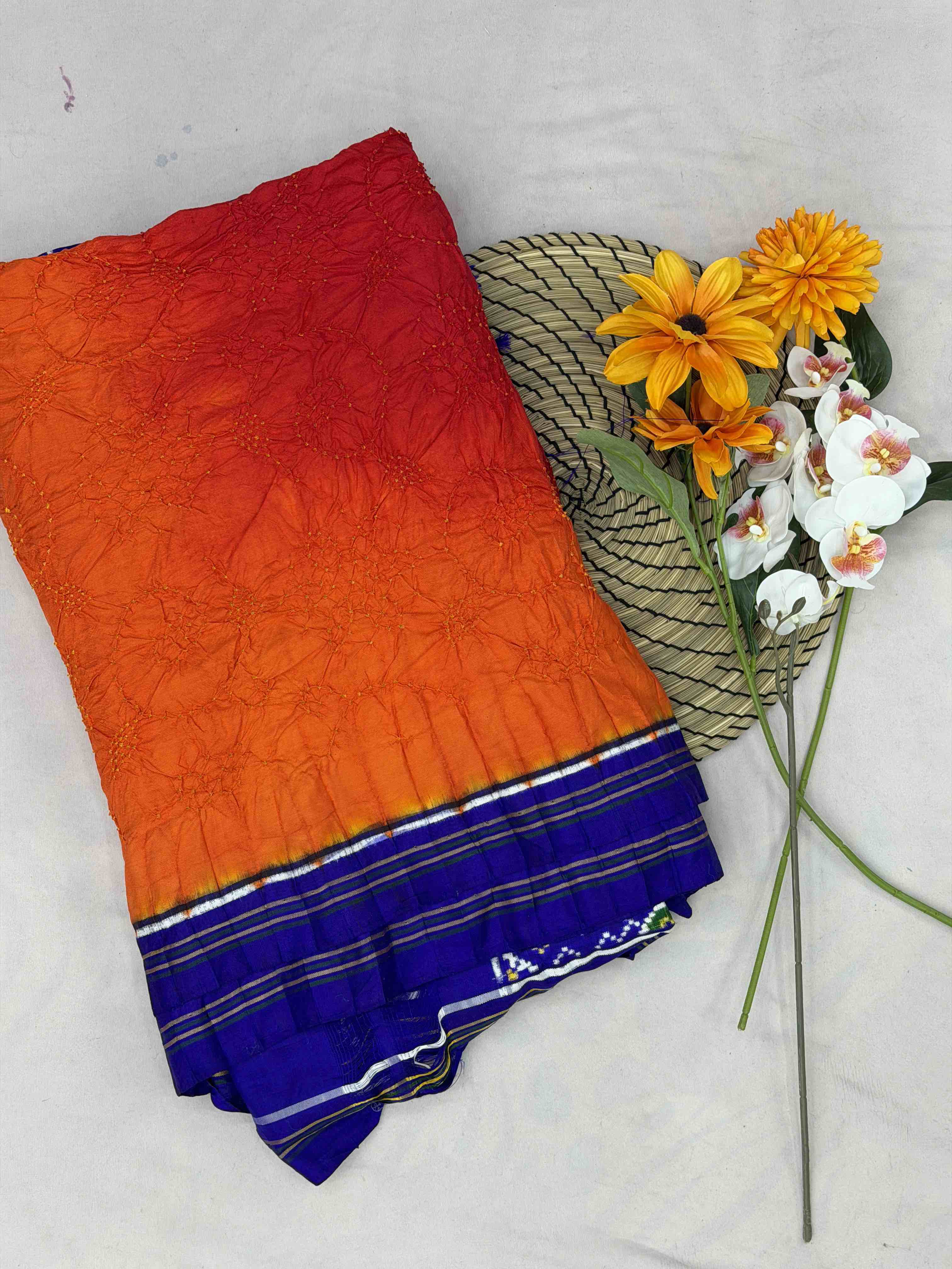 Blue with combination of Red & orange double ikat Patola with Bandhani