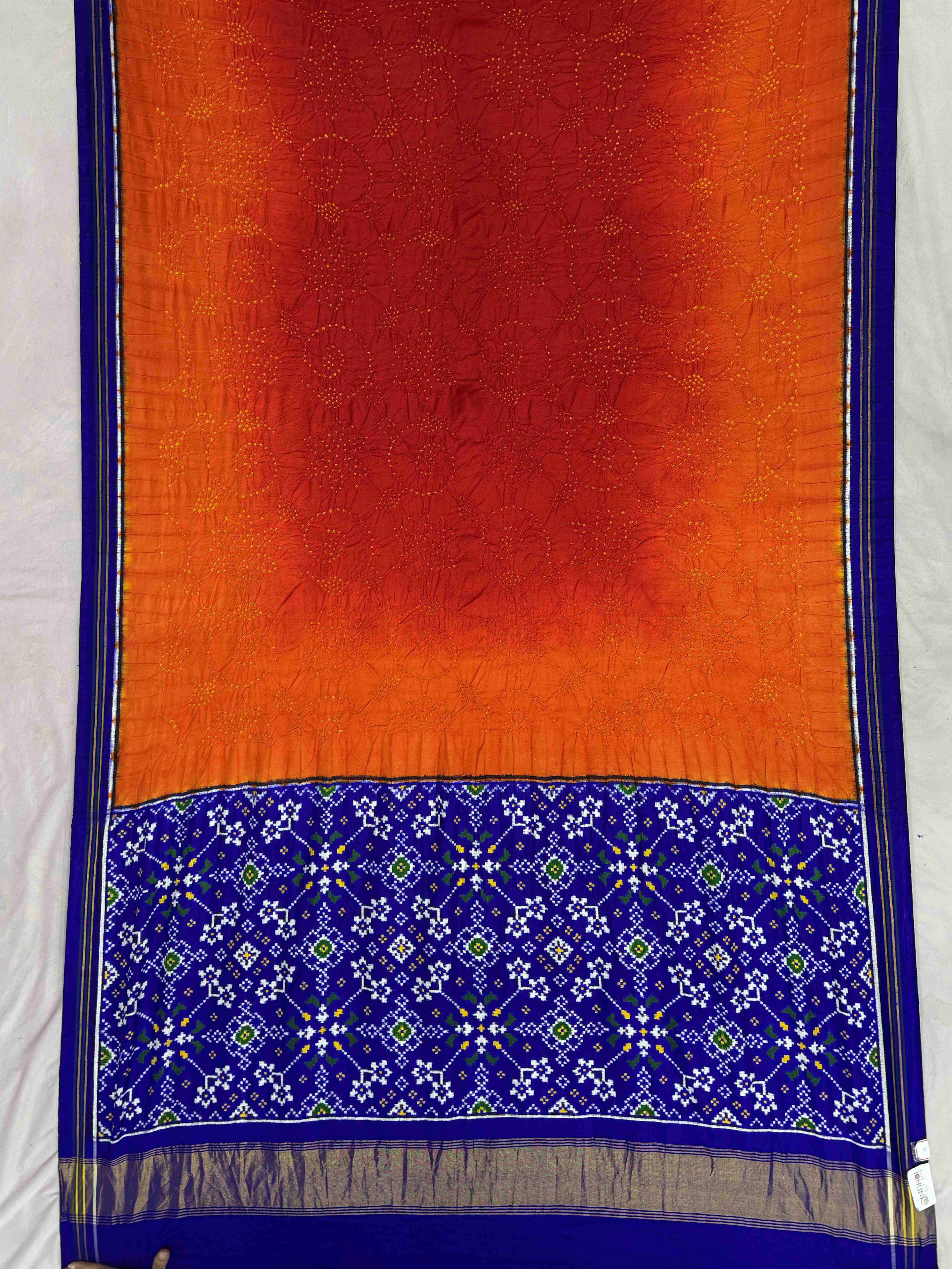 Blue with combination of Red & orange double ikat Patola with Bandhani