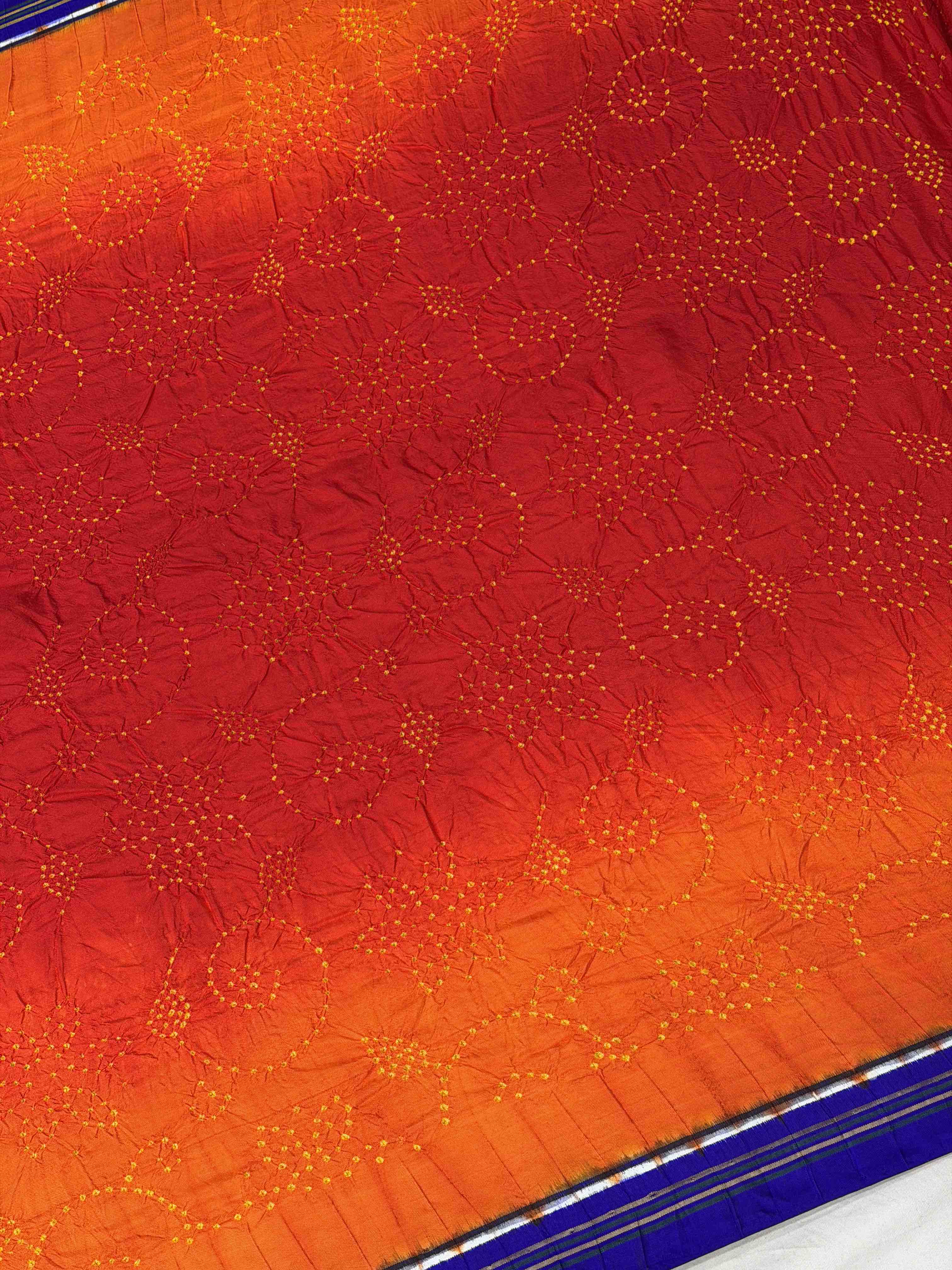 Blue with combination of Red & orange double ikat Patola with Bandhani