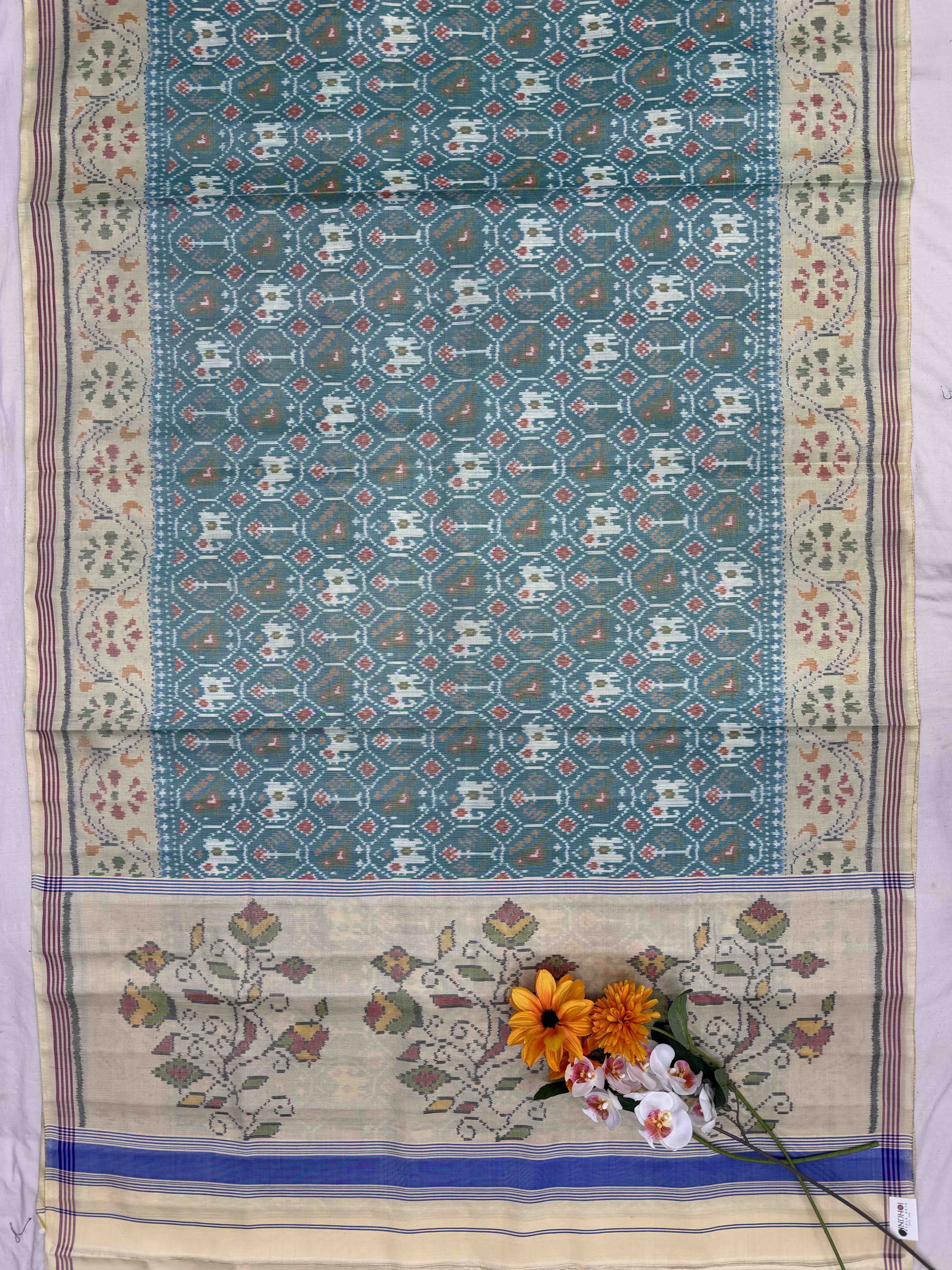 Off white & light Sea Green Narikunj Singe Ikat Patola Sarees