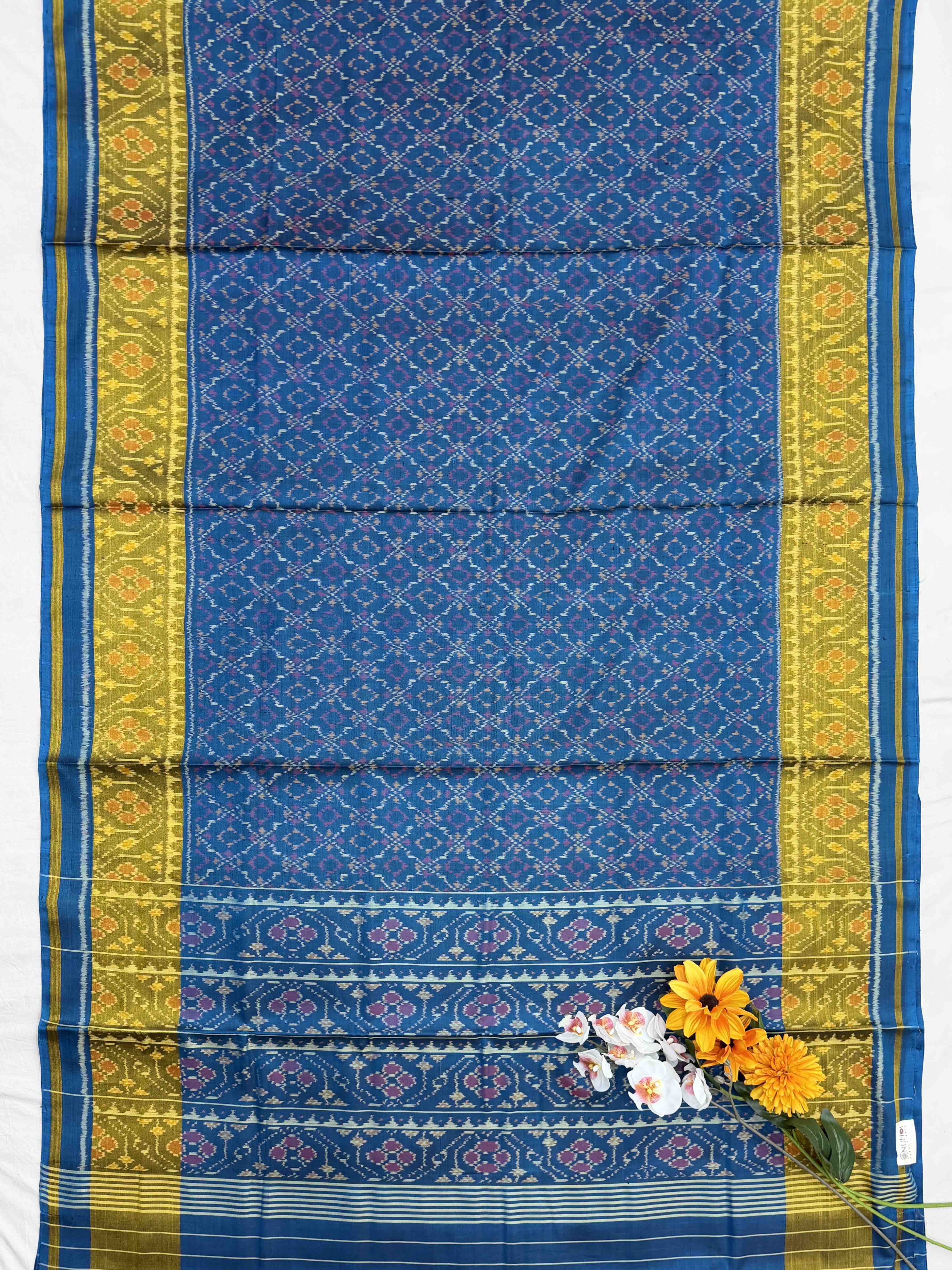 Light blue shade buttonful Rajkoti Patola Saree