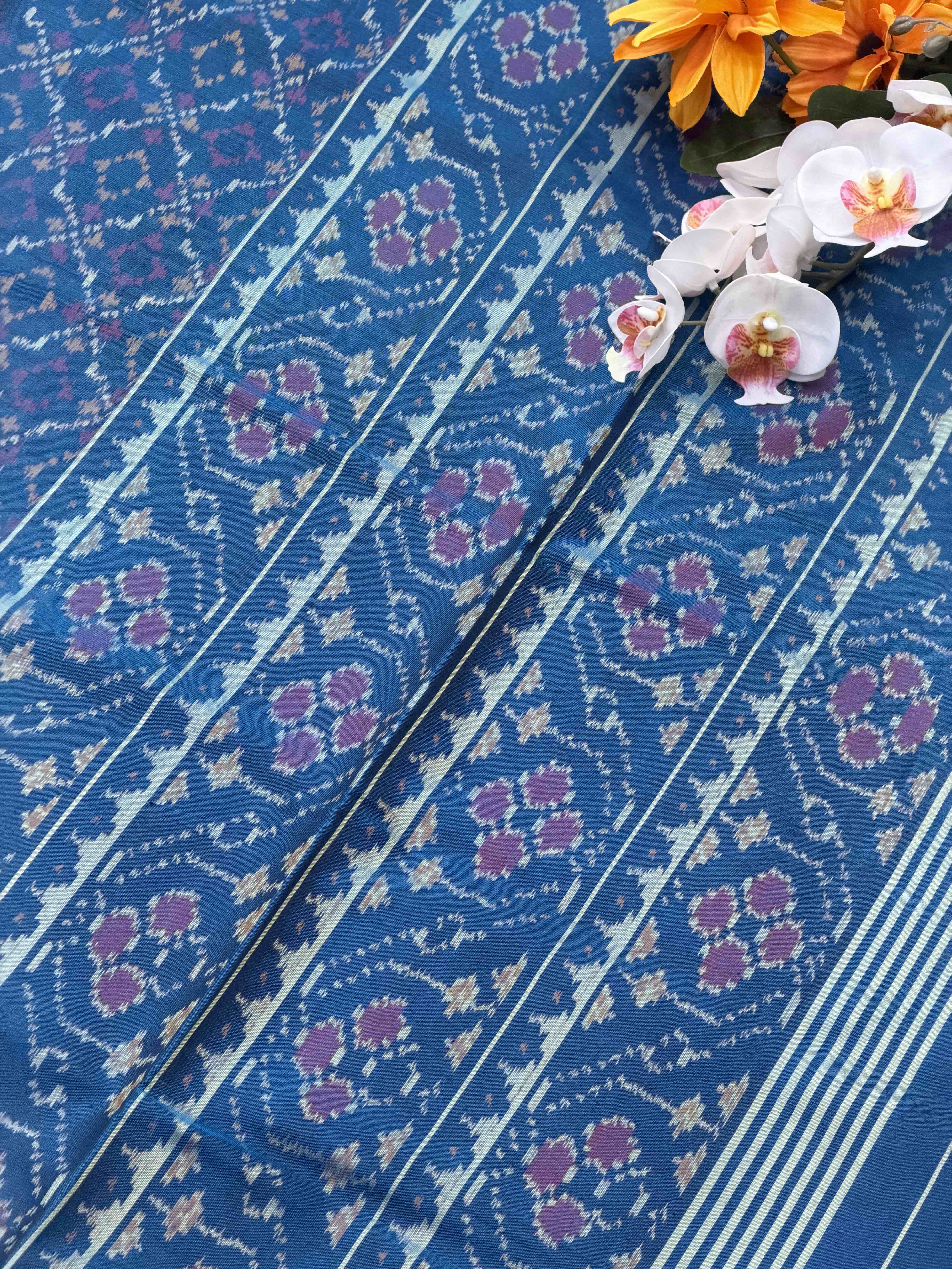 Light blue shade buttonful Rajkoti Patola Saree