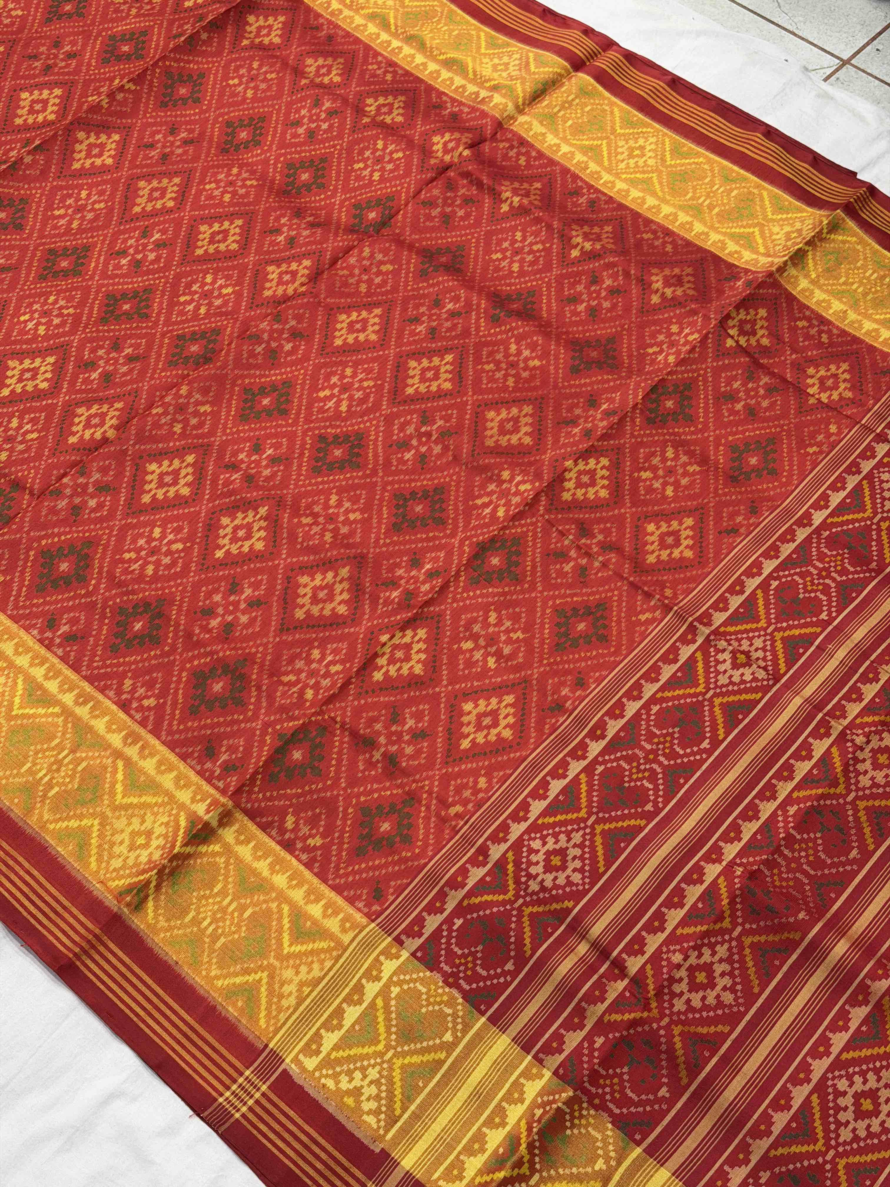 Brick Red Panchanda tissue border rajkot Patola Saree