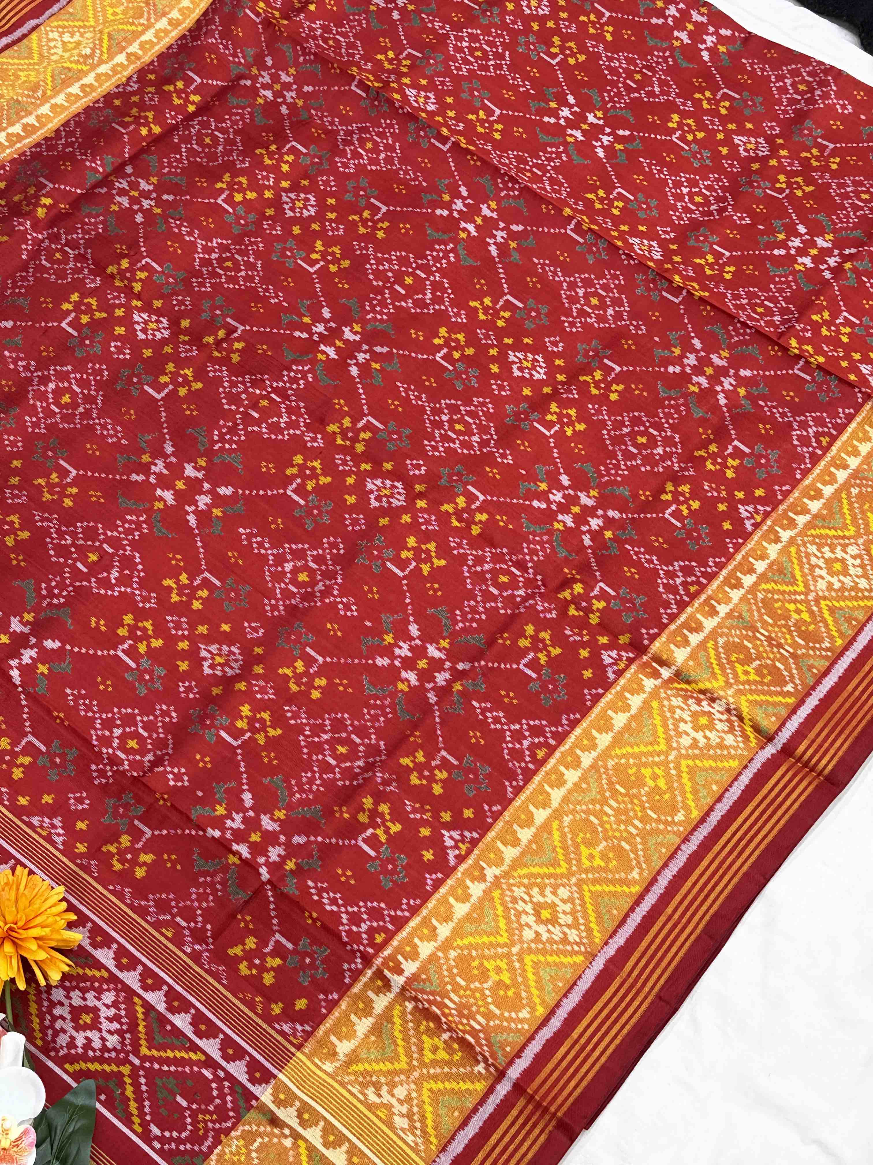 Red navaratan tissue border Patola Saree