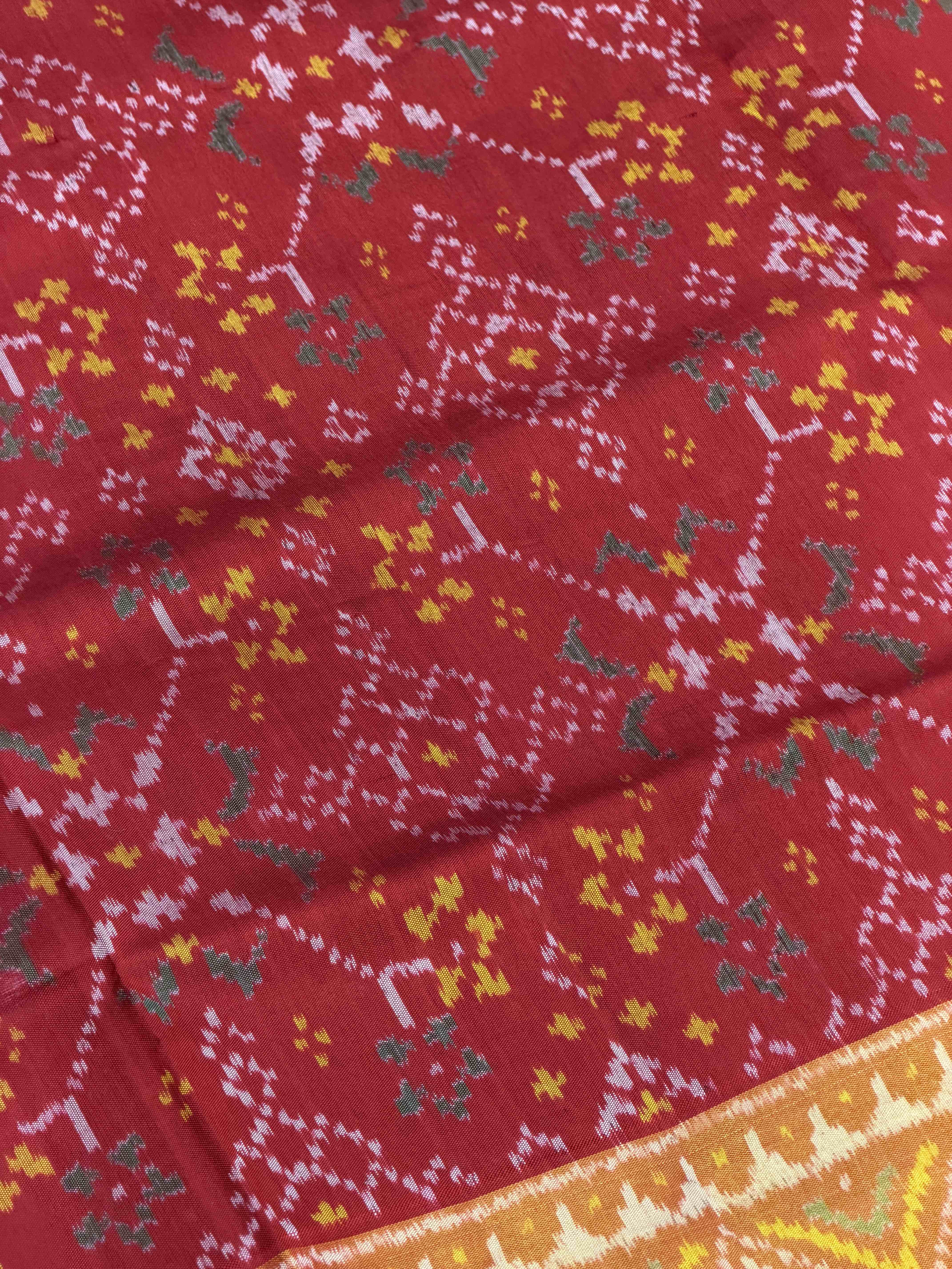 Red navaratan tissue border Patola Saree