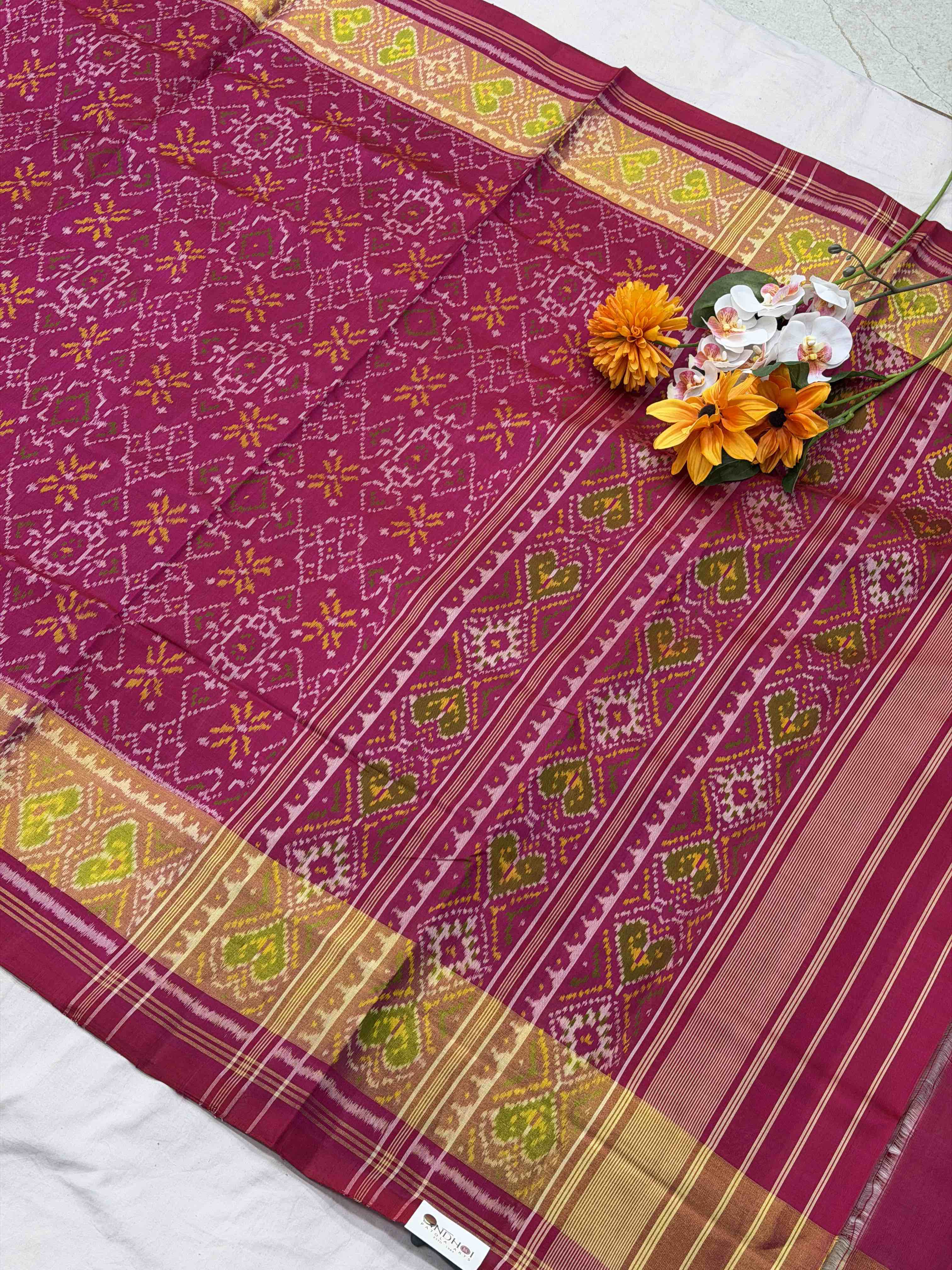 Pink Manekchawk tissue border rajkot patola saree