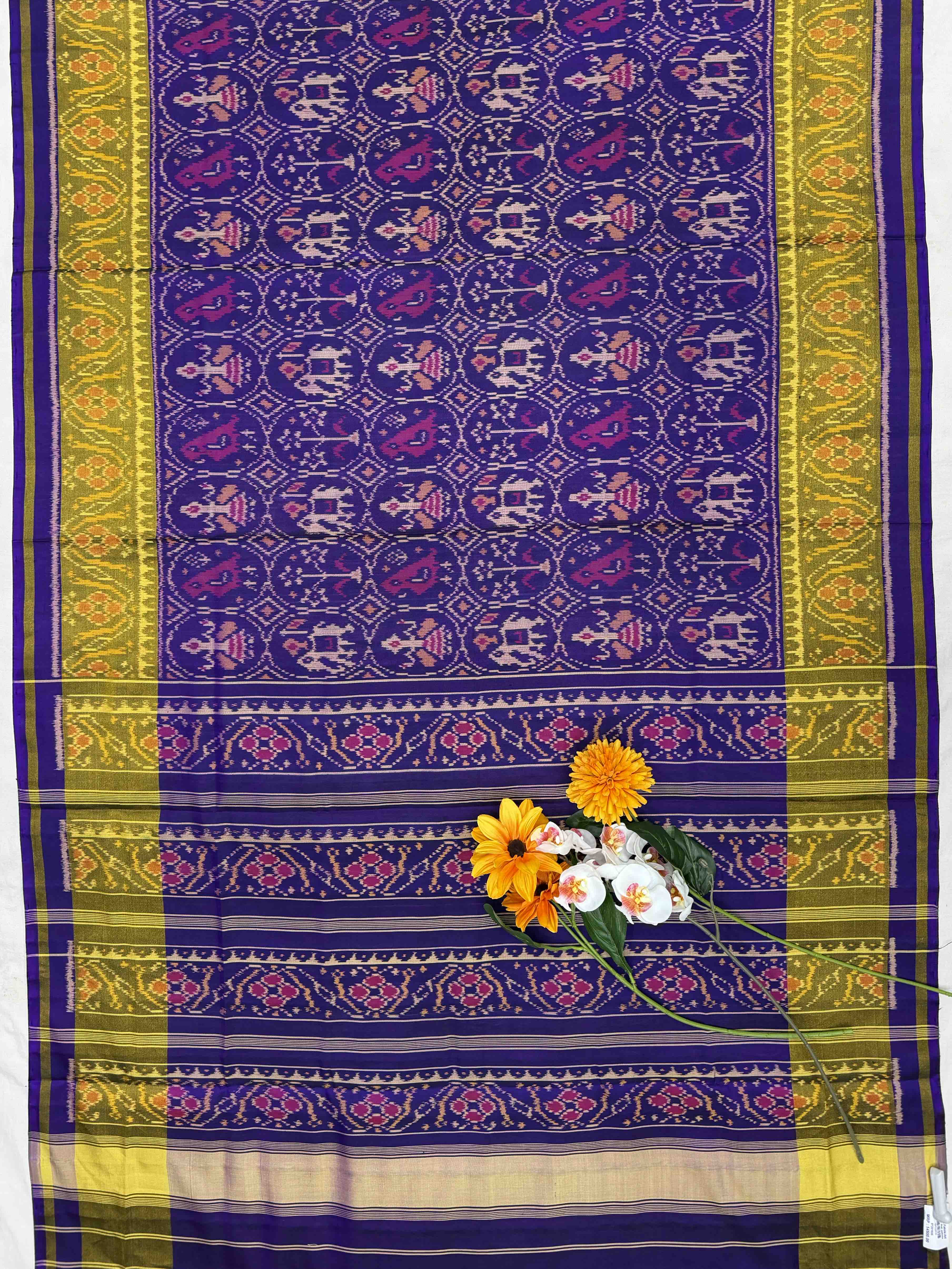 Purple narikunj patola saree in tissue border
