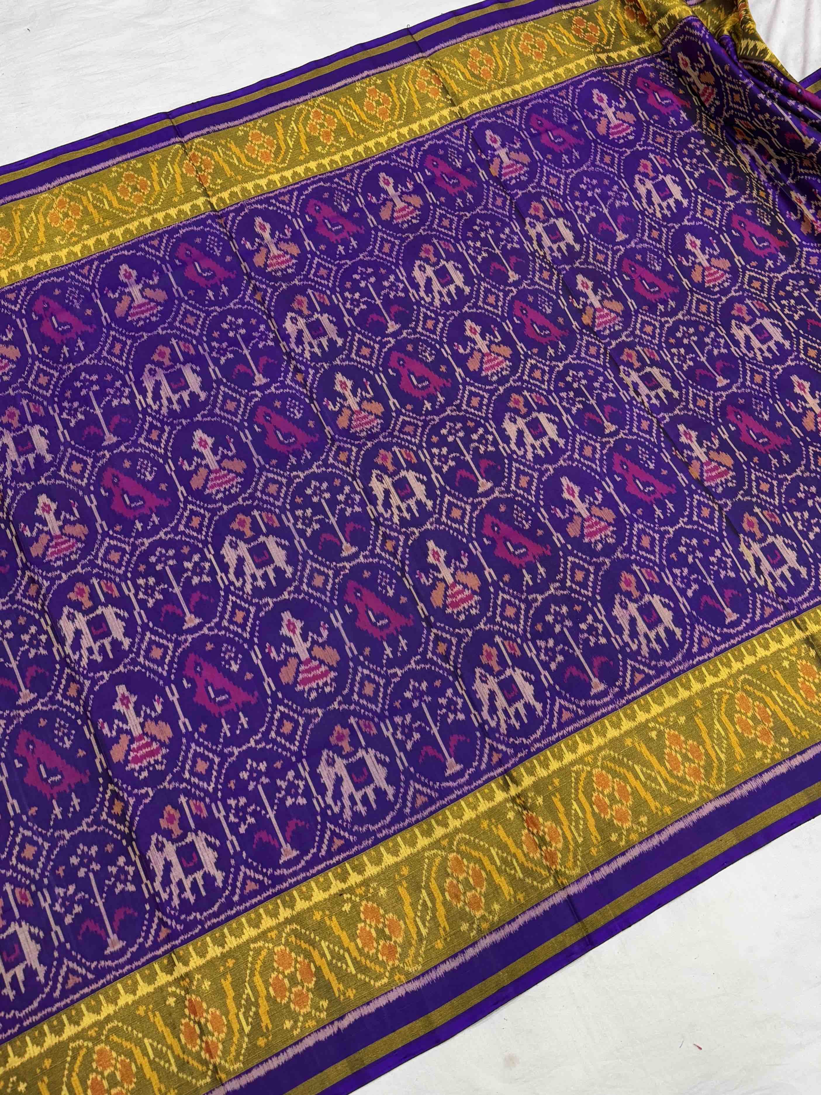 Purple narikunj patola saree in tissue border