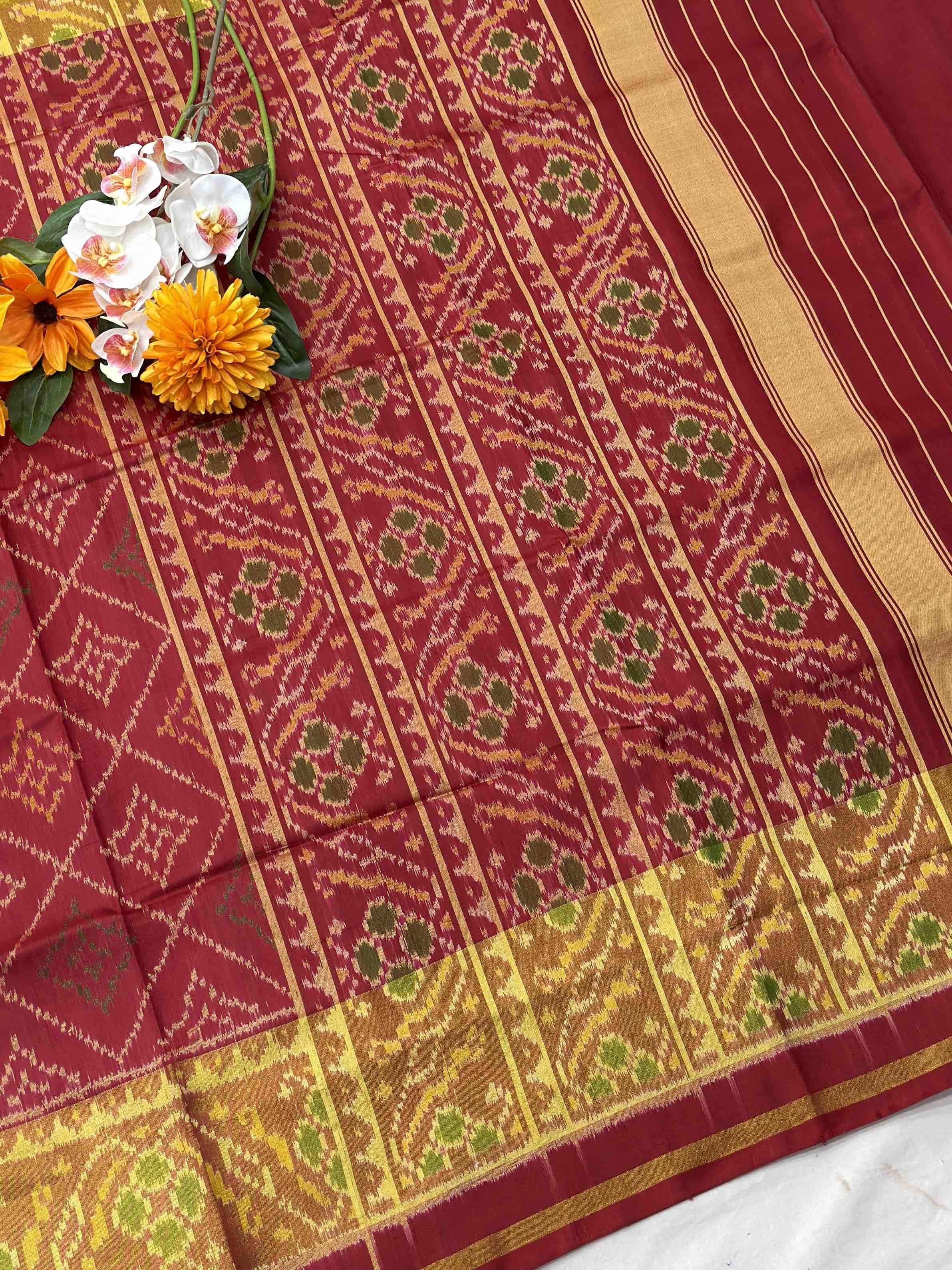 Maroonish red Chokhtabhat Rajkot Patola saree