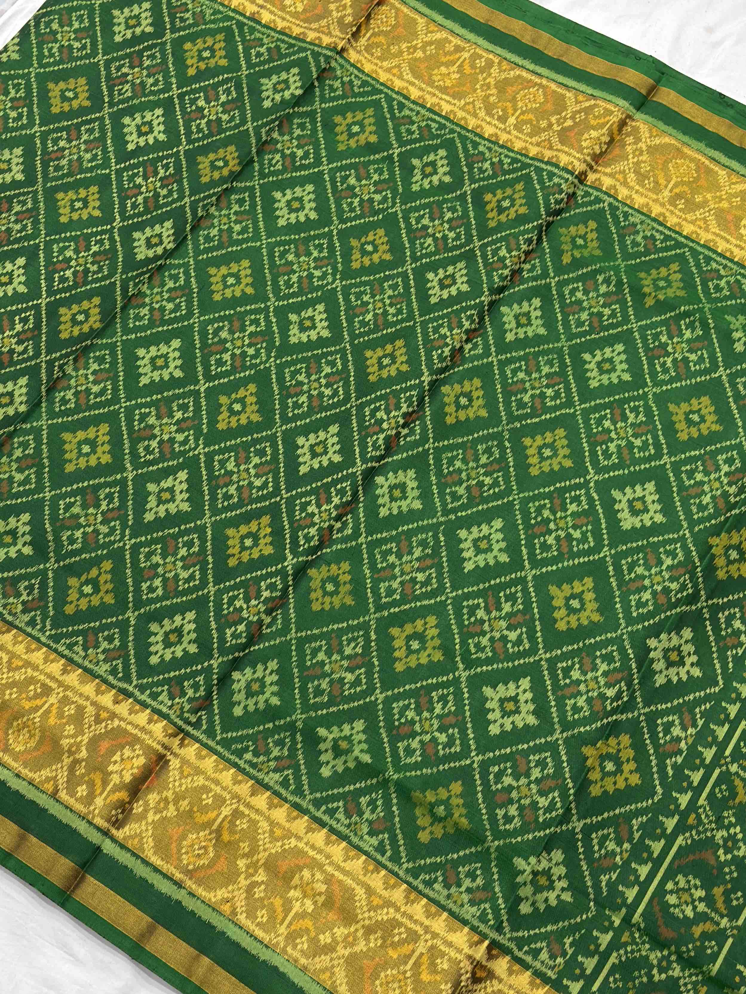 Green tissue border panchanda rajkot patola saree