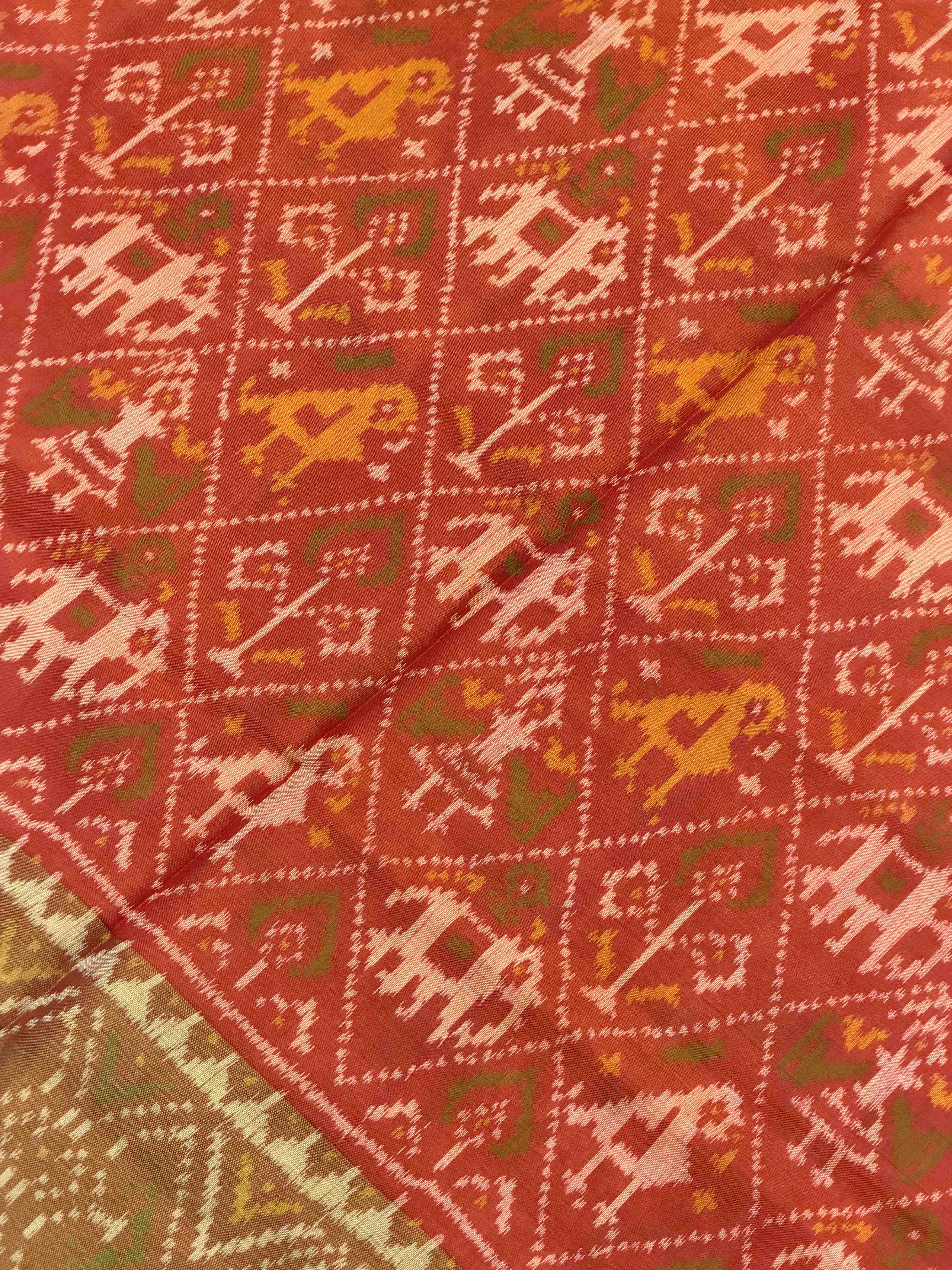 orange narikunj tissue border rajkot patola saree