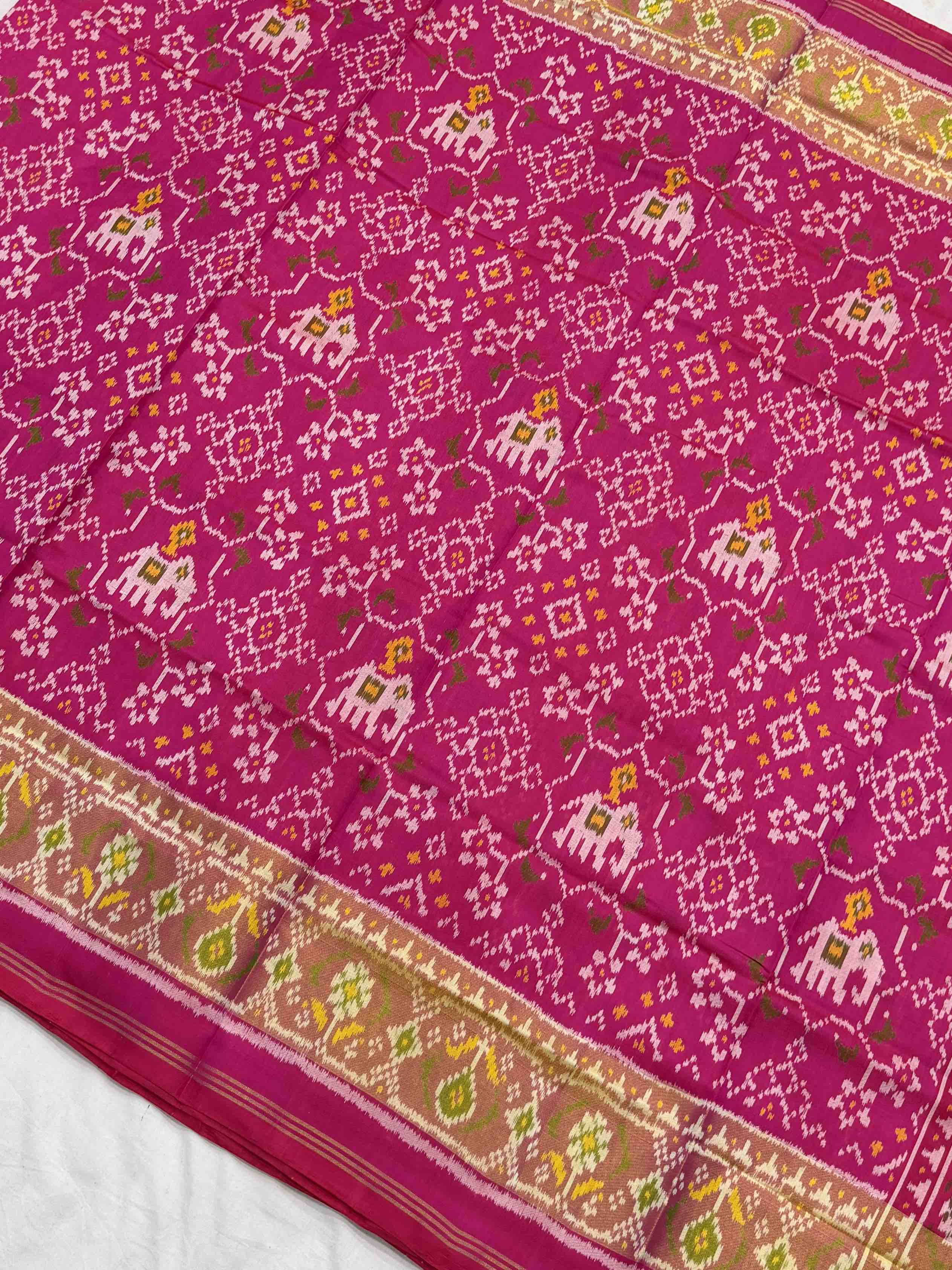 Pink tissue border navartan with Hathi Patola Saree