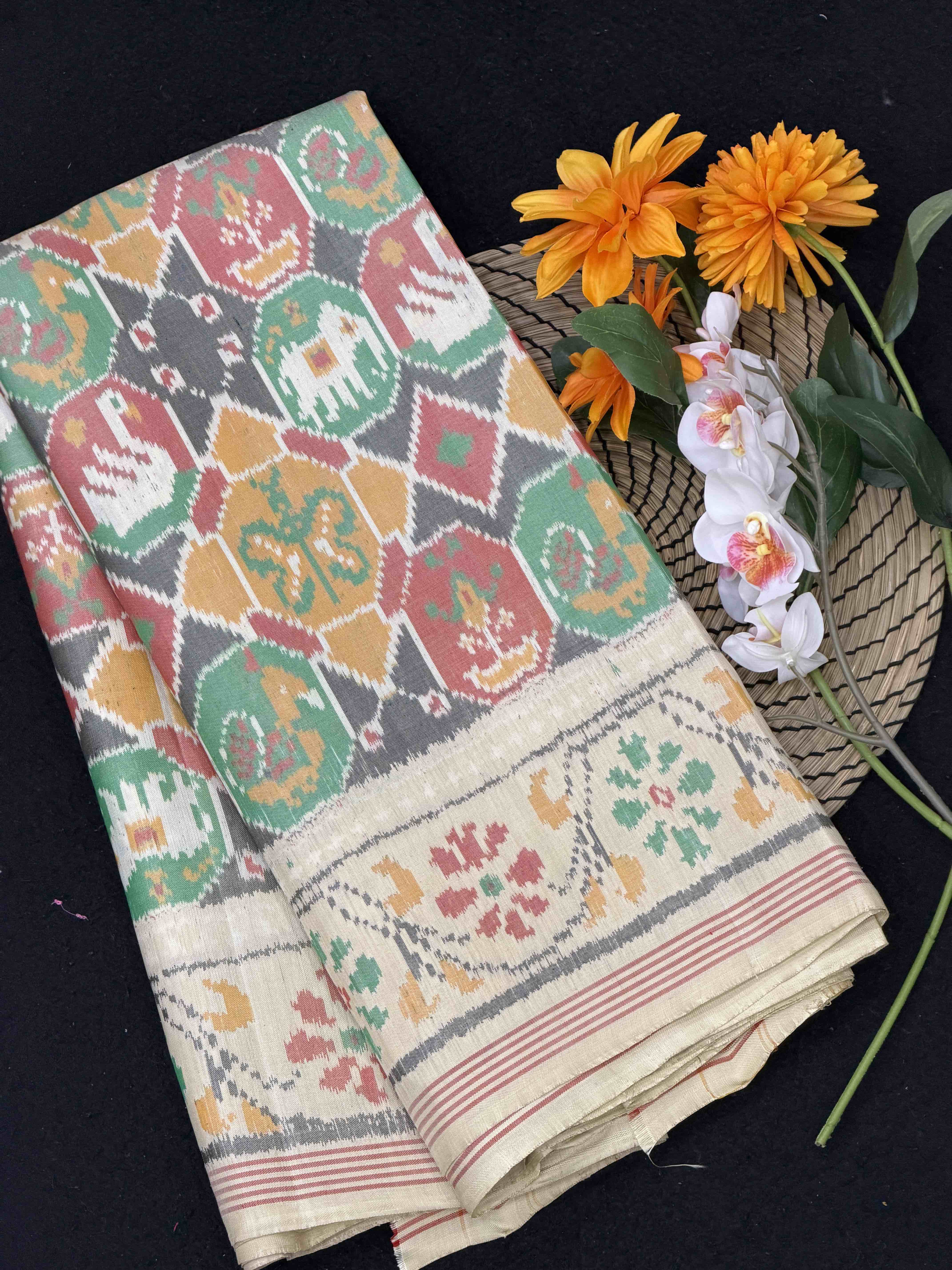 Cream with multi figure beige Single ikat Patola