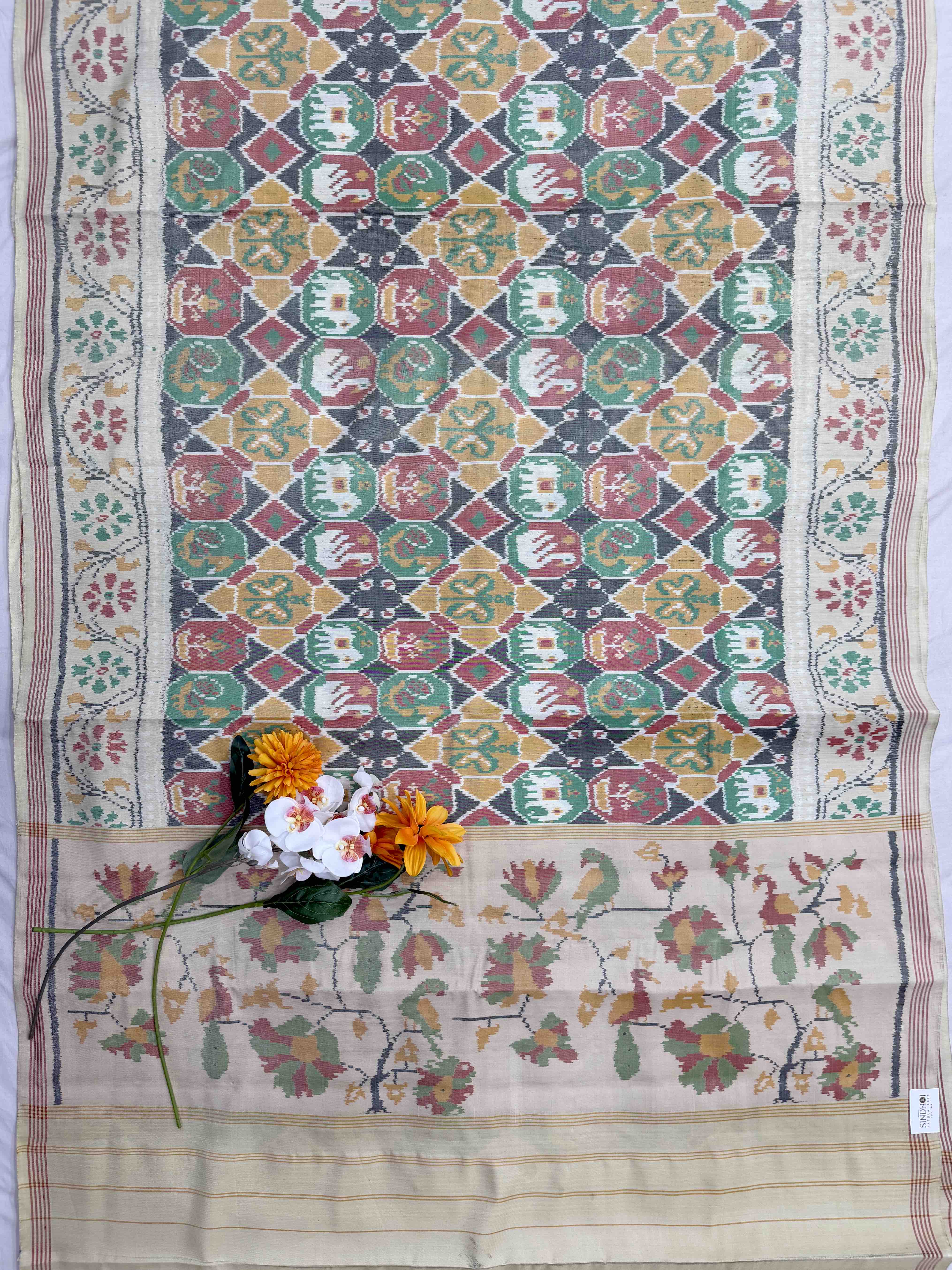 Cream with multi figure beige Single ikat Patola