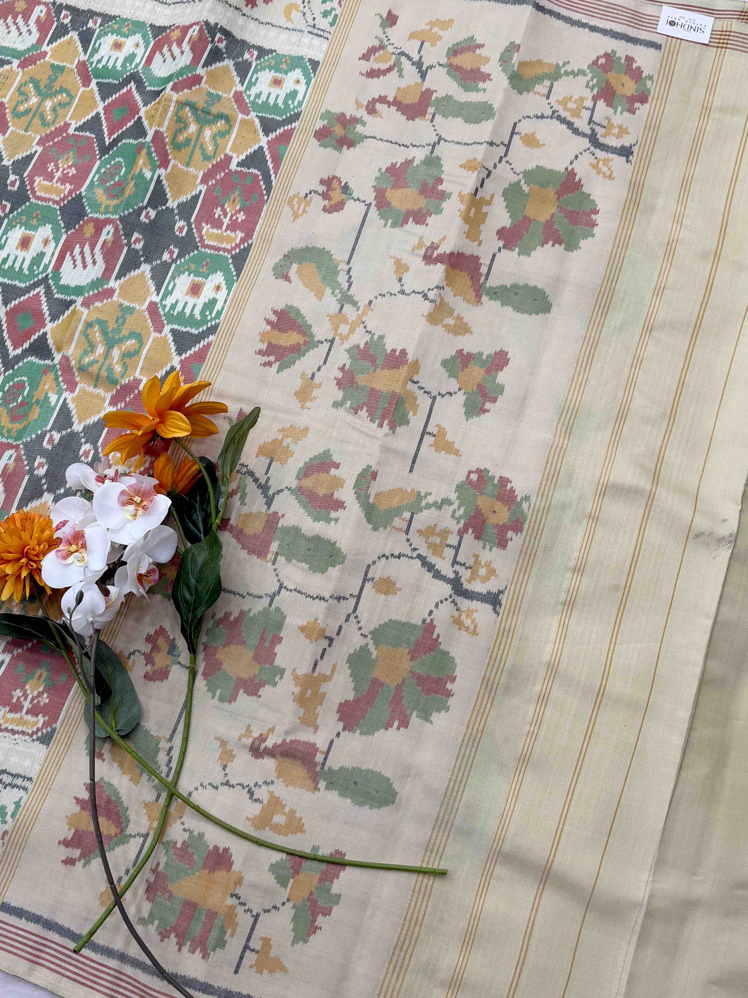 Cream with multi figure beige Single ikat Patola