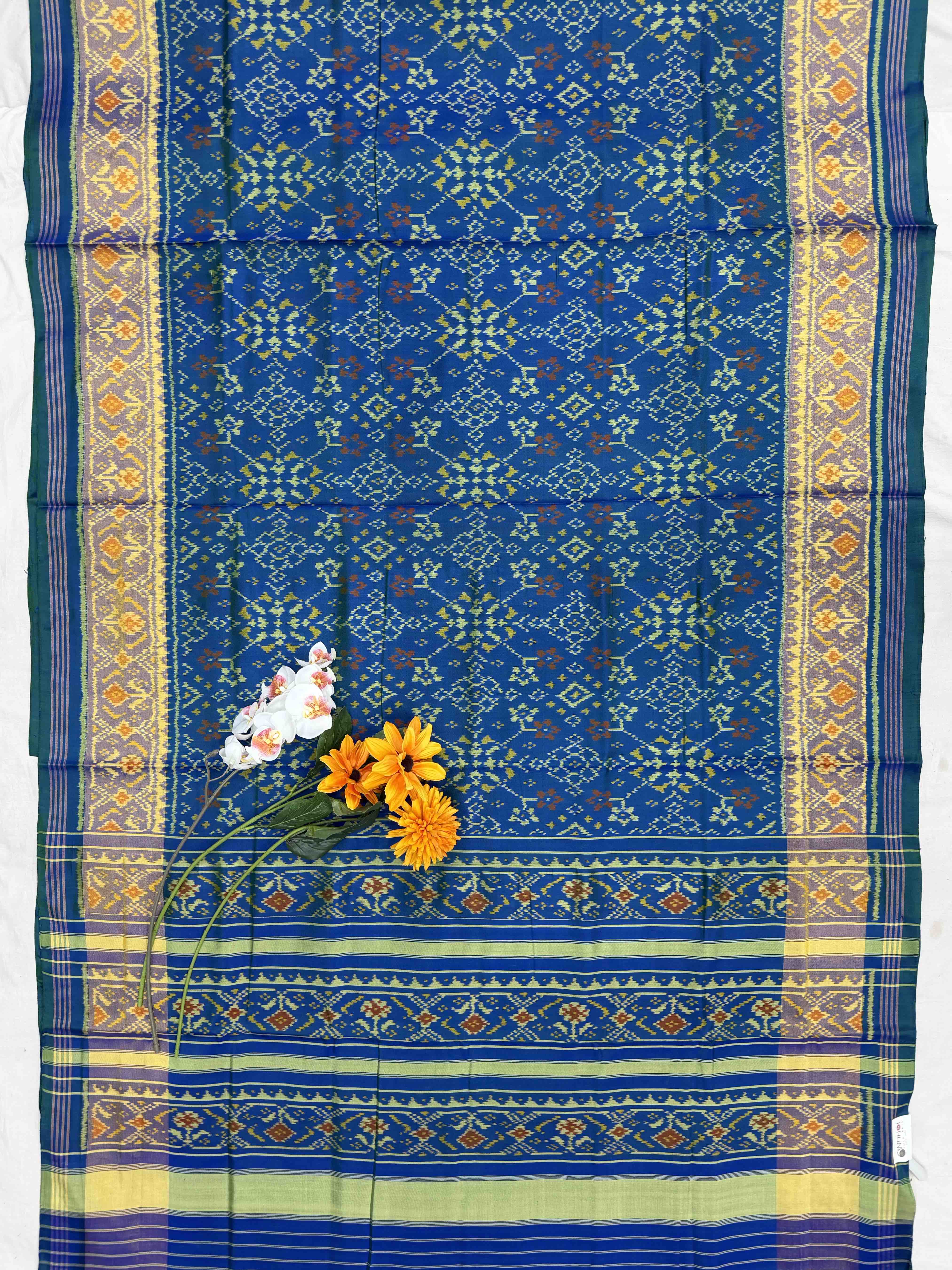 Peacock blue navarat tissue border Rajkot Patola Saree