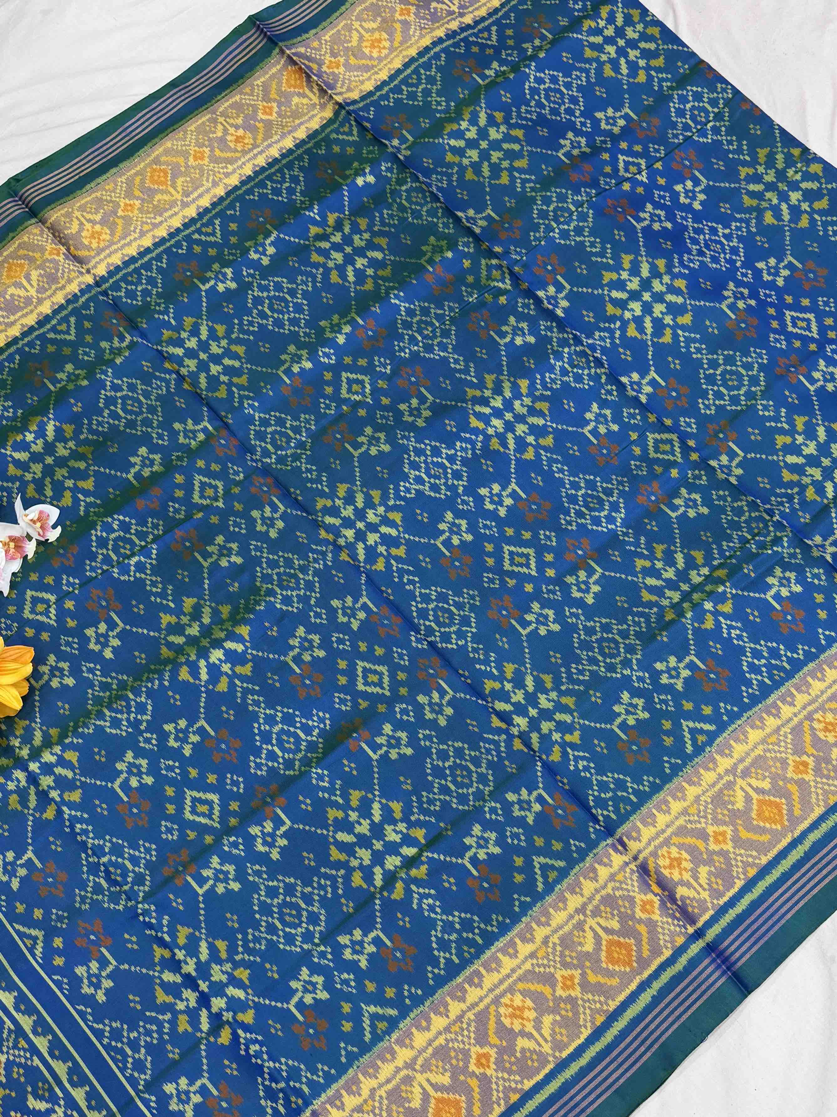 Peacock blue navarat tissue border Rajkot Patola Saree