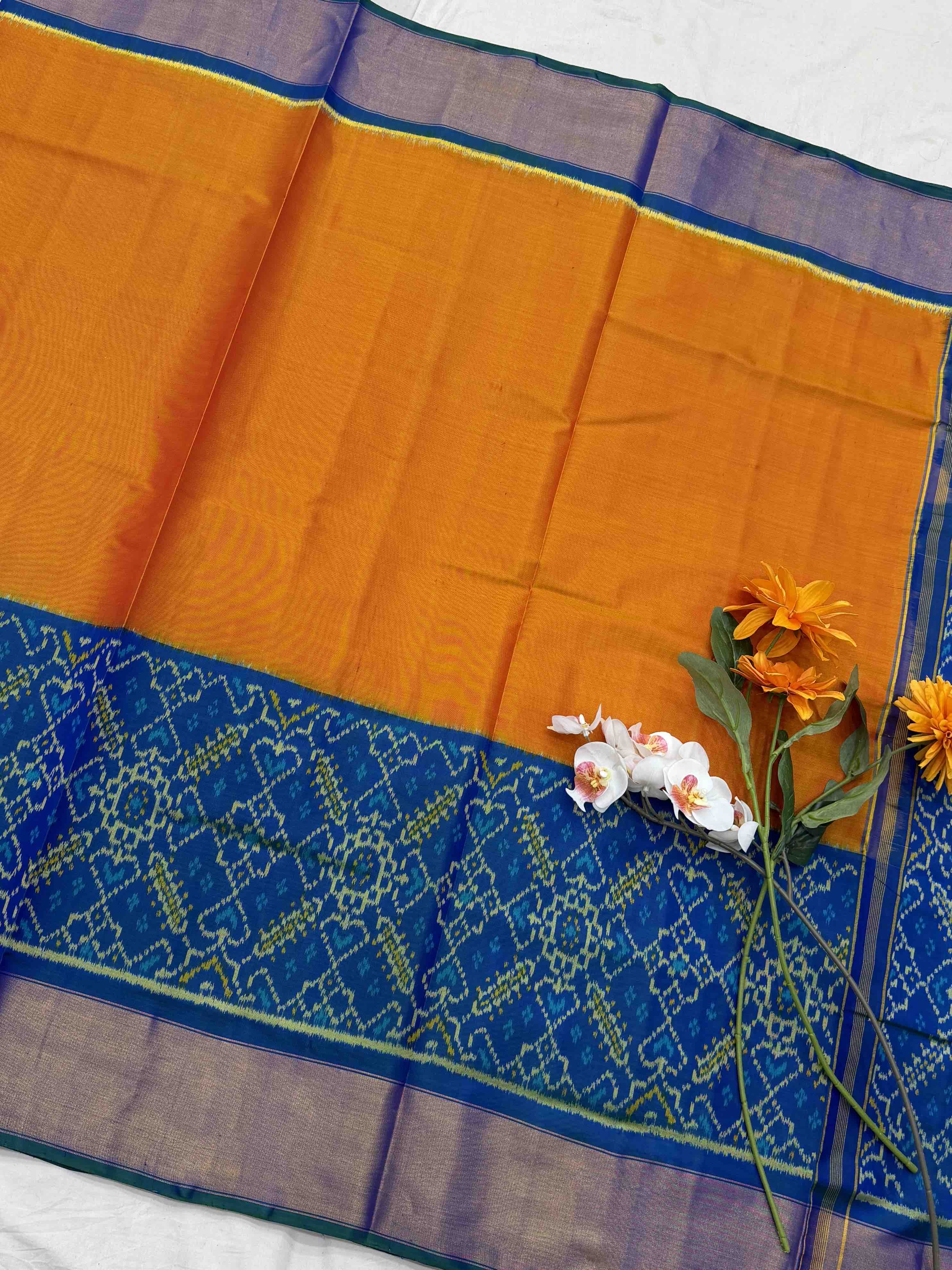 Peacock blue & orange skirt border Rajkot Patola Saree