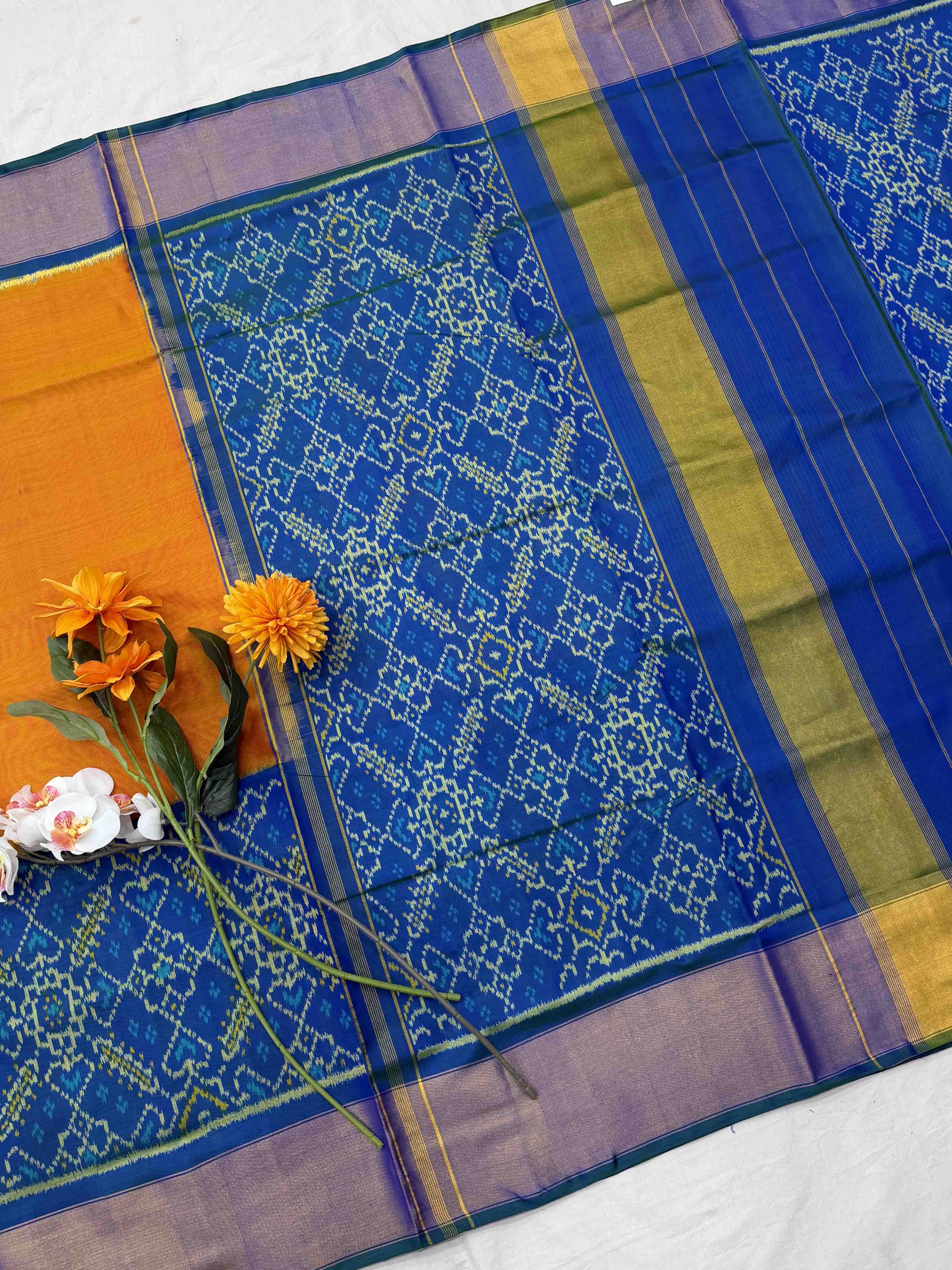 Peacock blue & orange skirt border Rajkot Patola Saree