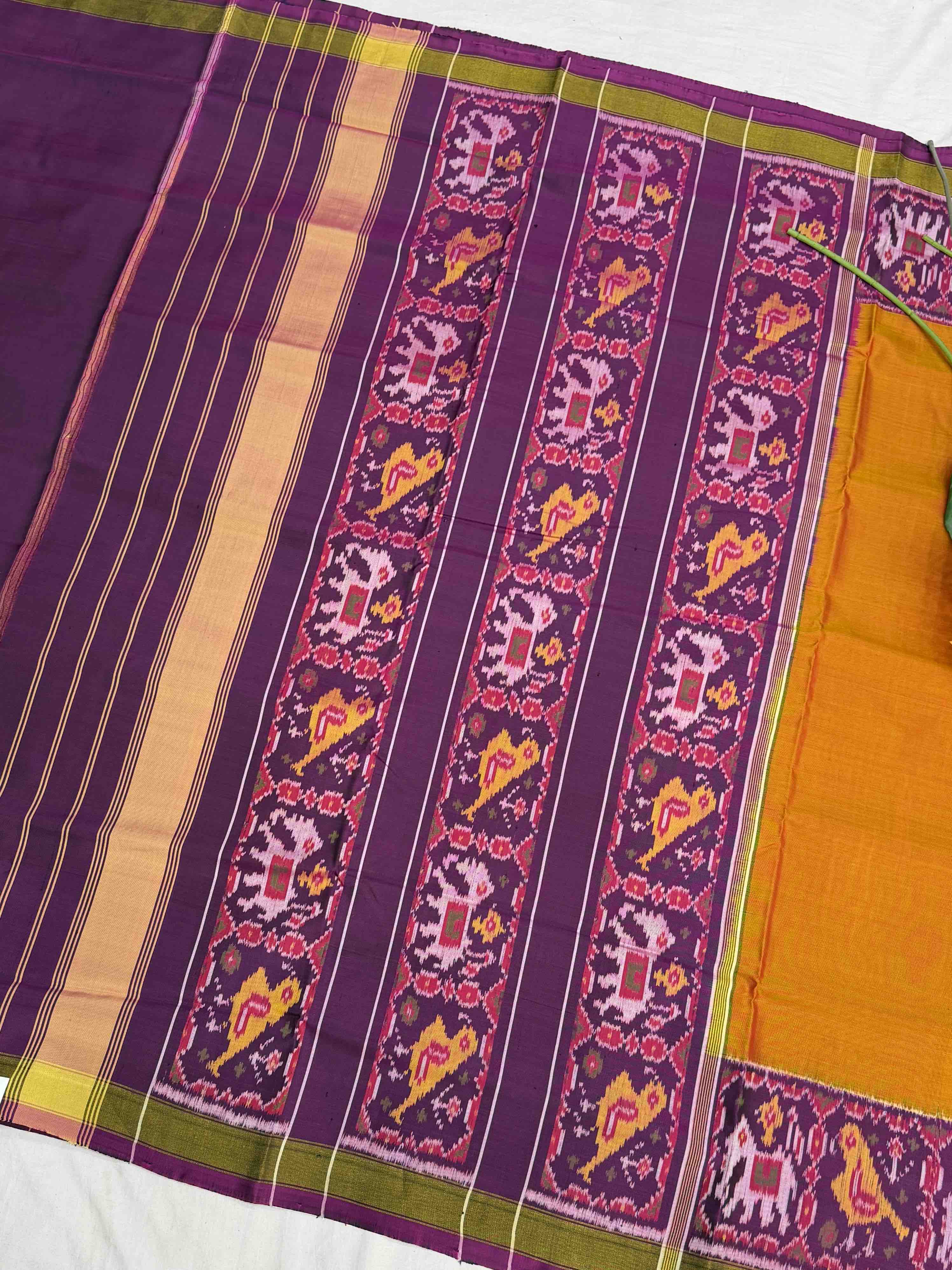 Magenta Narikunj Pallu & plain orange gala border Patola Saree