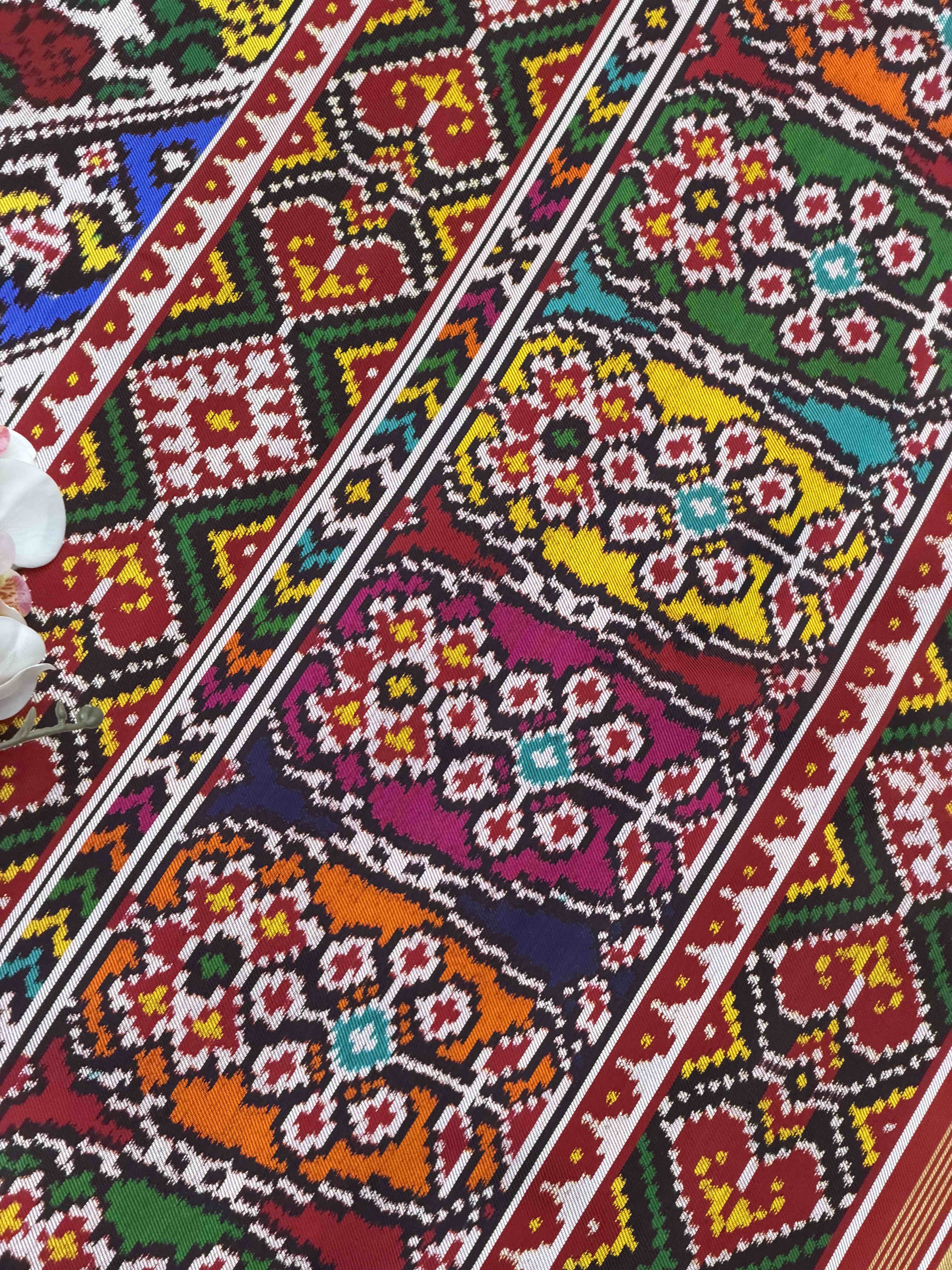 Narikunj with rose petals multicolour twill Patola Saree