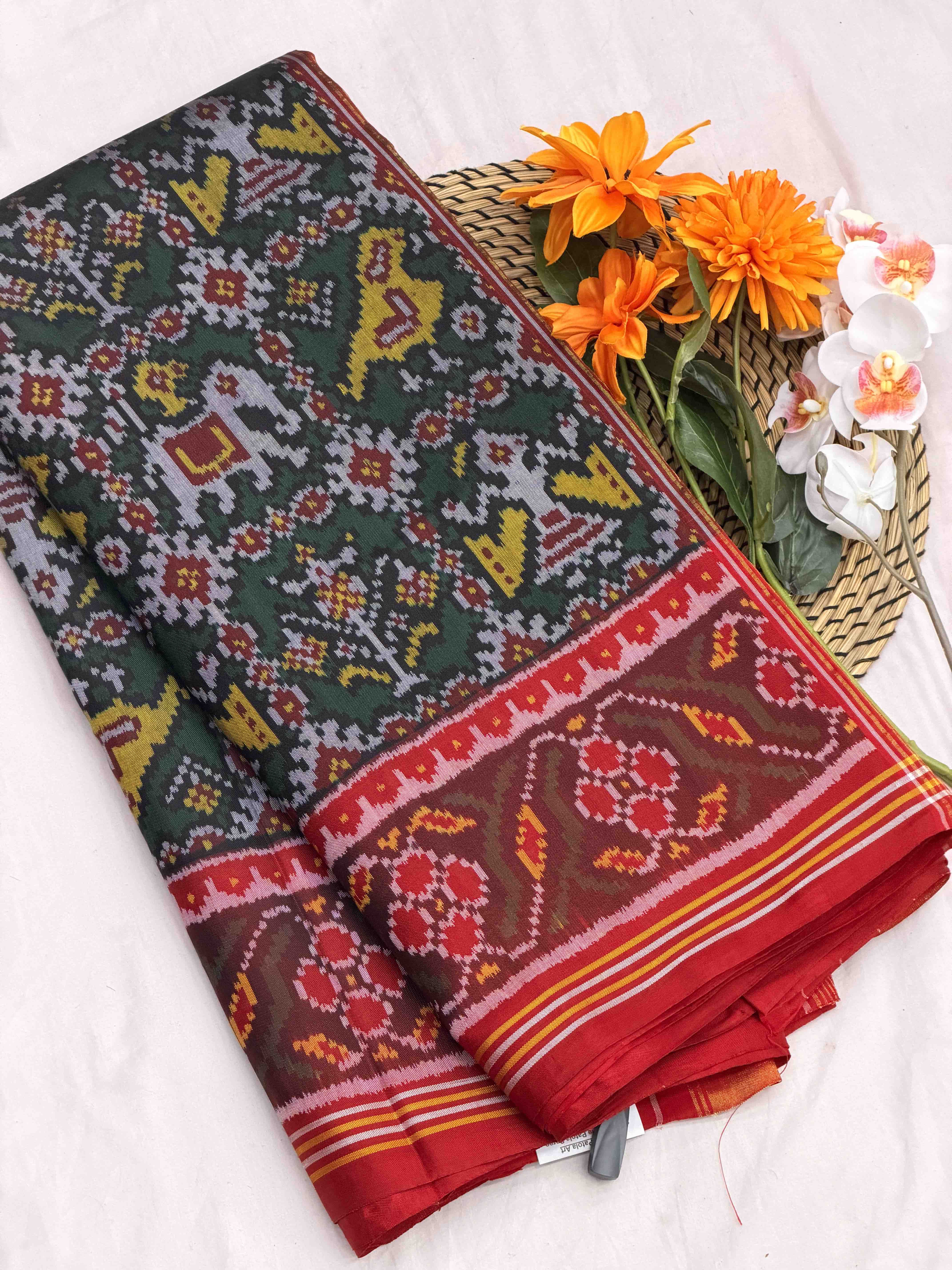 Maroon & dark green Sankli Narikunj Patola Saree