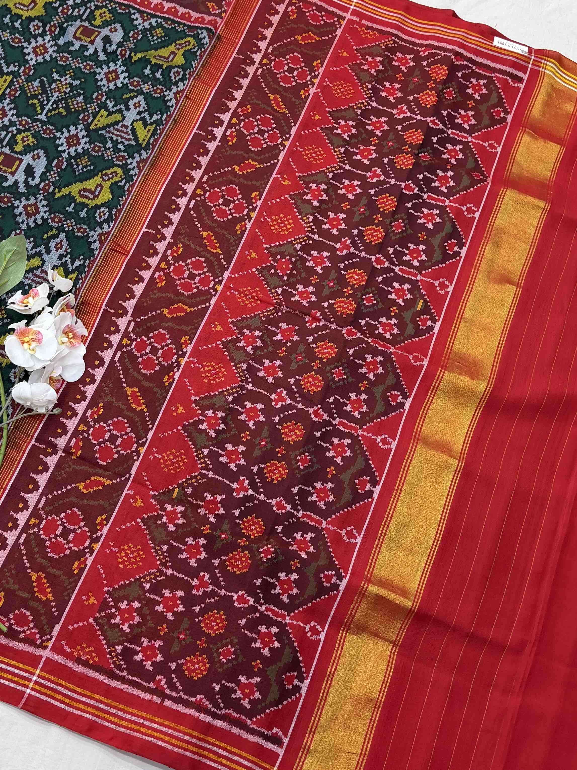 Maroon & dark green Sankli Narikunj Patola Saree
