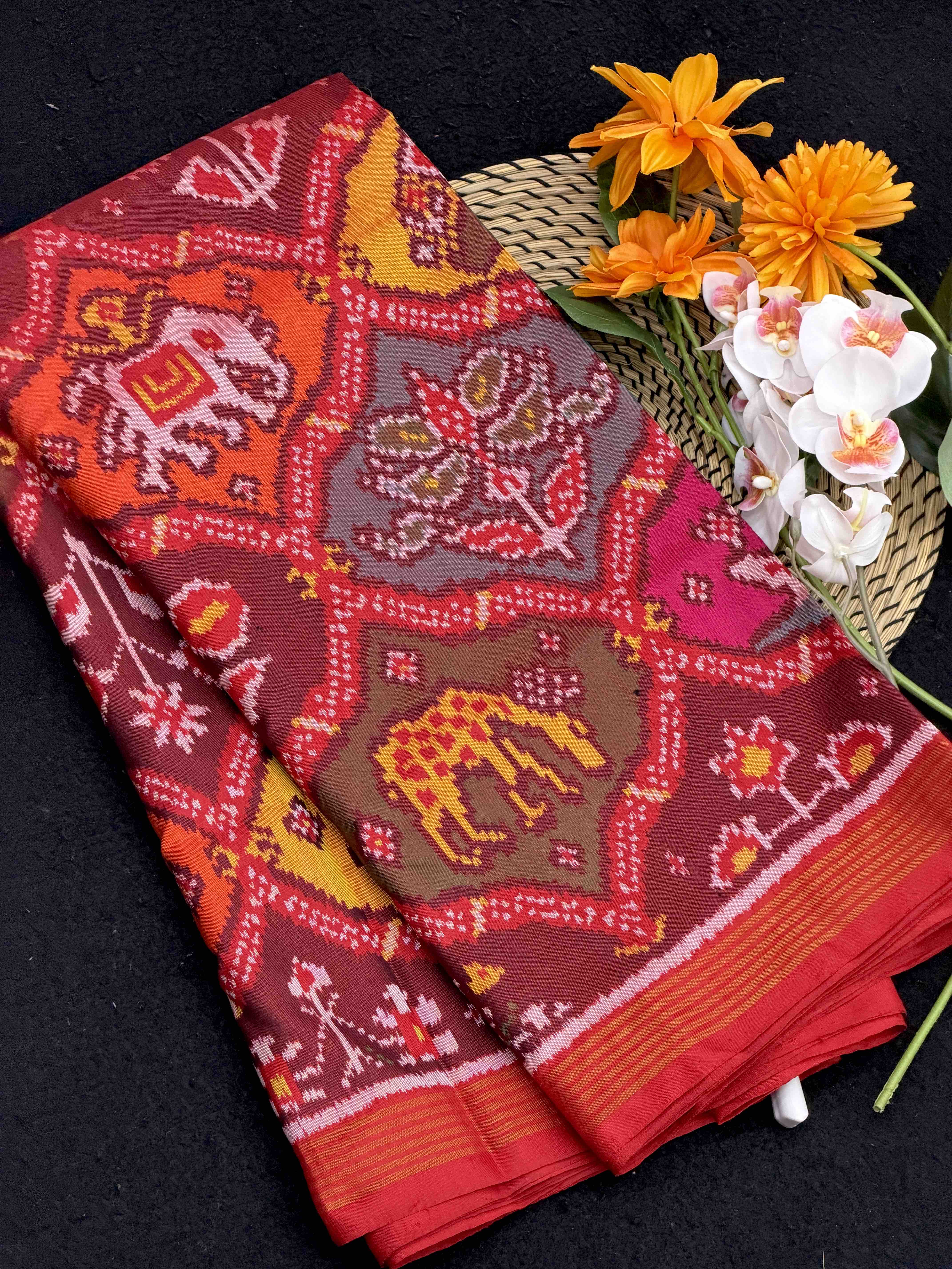 Red with multi coloured motifs Single ikat Patan Patola