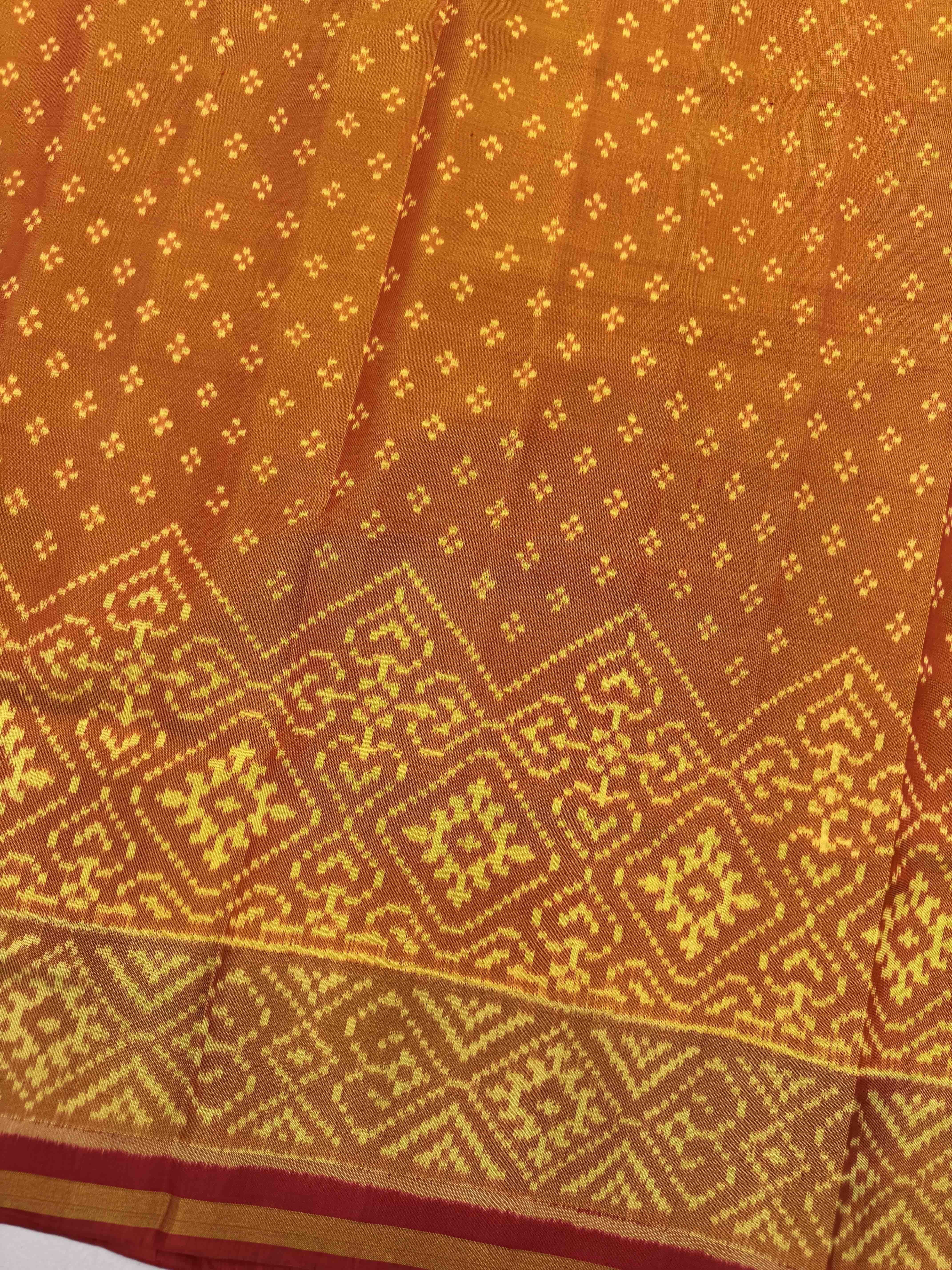 Golden Yellow Booty with Panchanda Scut Border Patola Saree