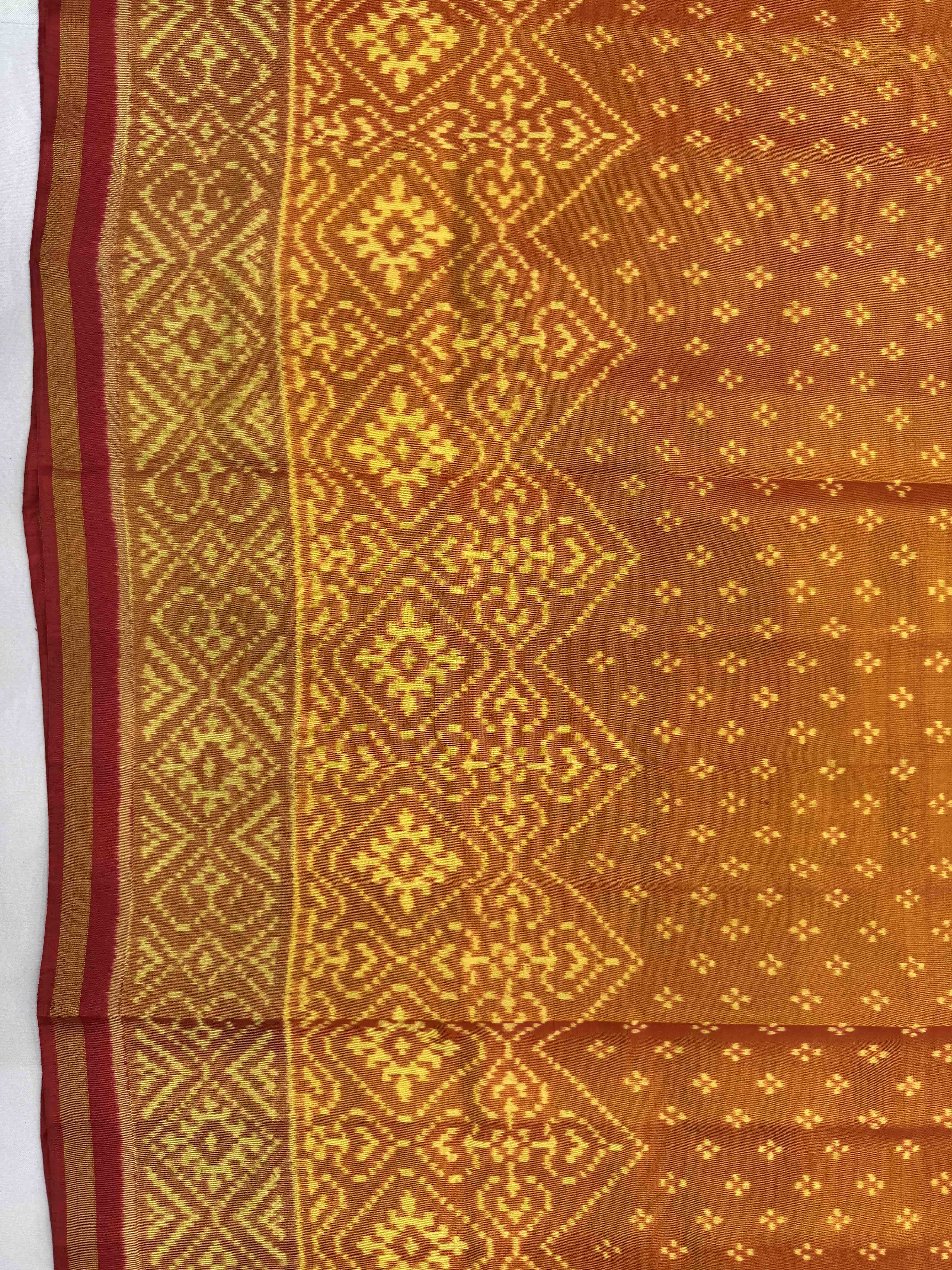 Golden Yellow Booty with Panchanda Scut Border Patola Saree