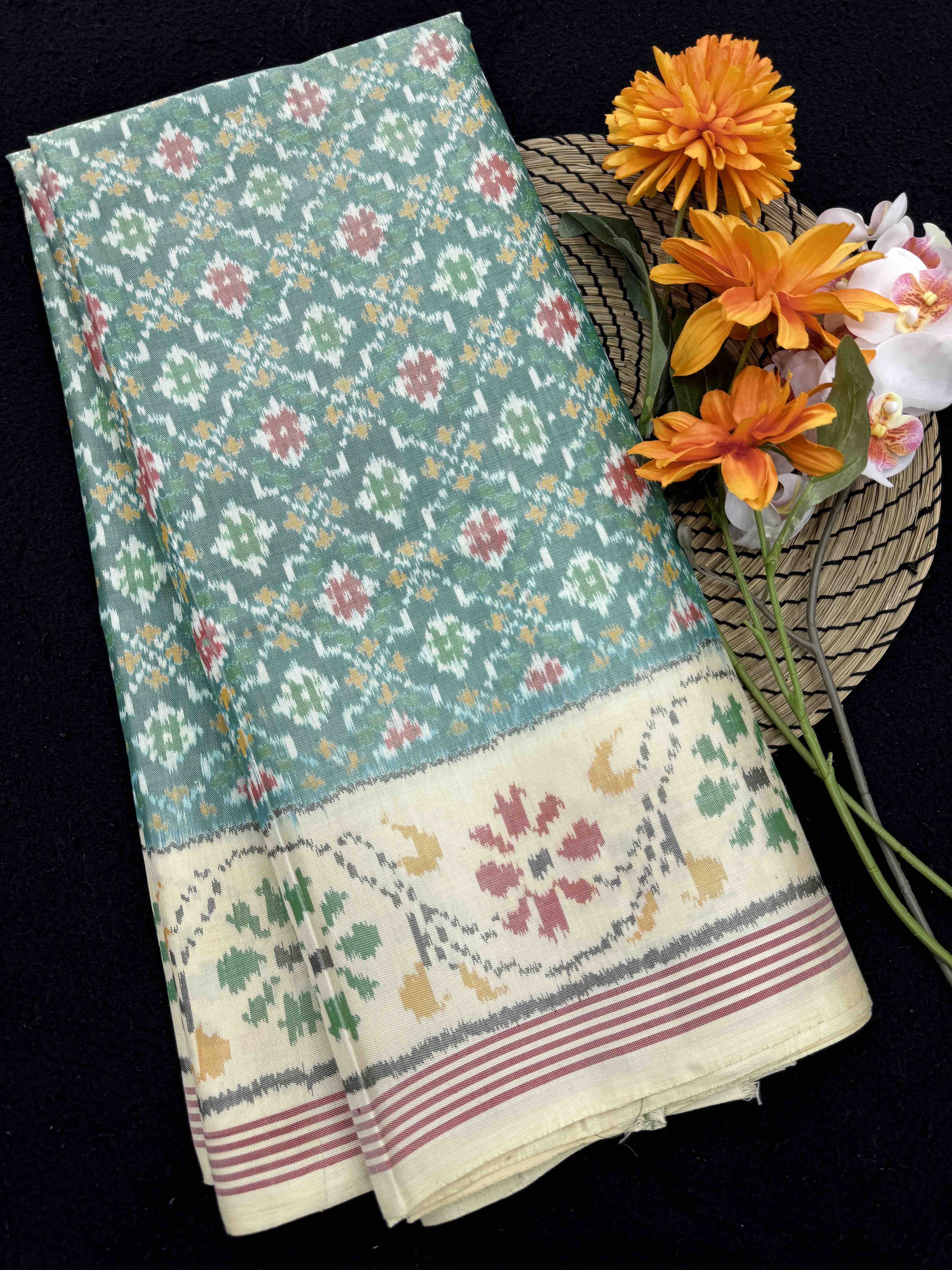 Off White & Sea Green Buttonful Single Ikat Patan Patola Saree