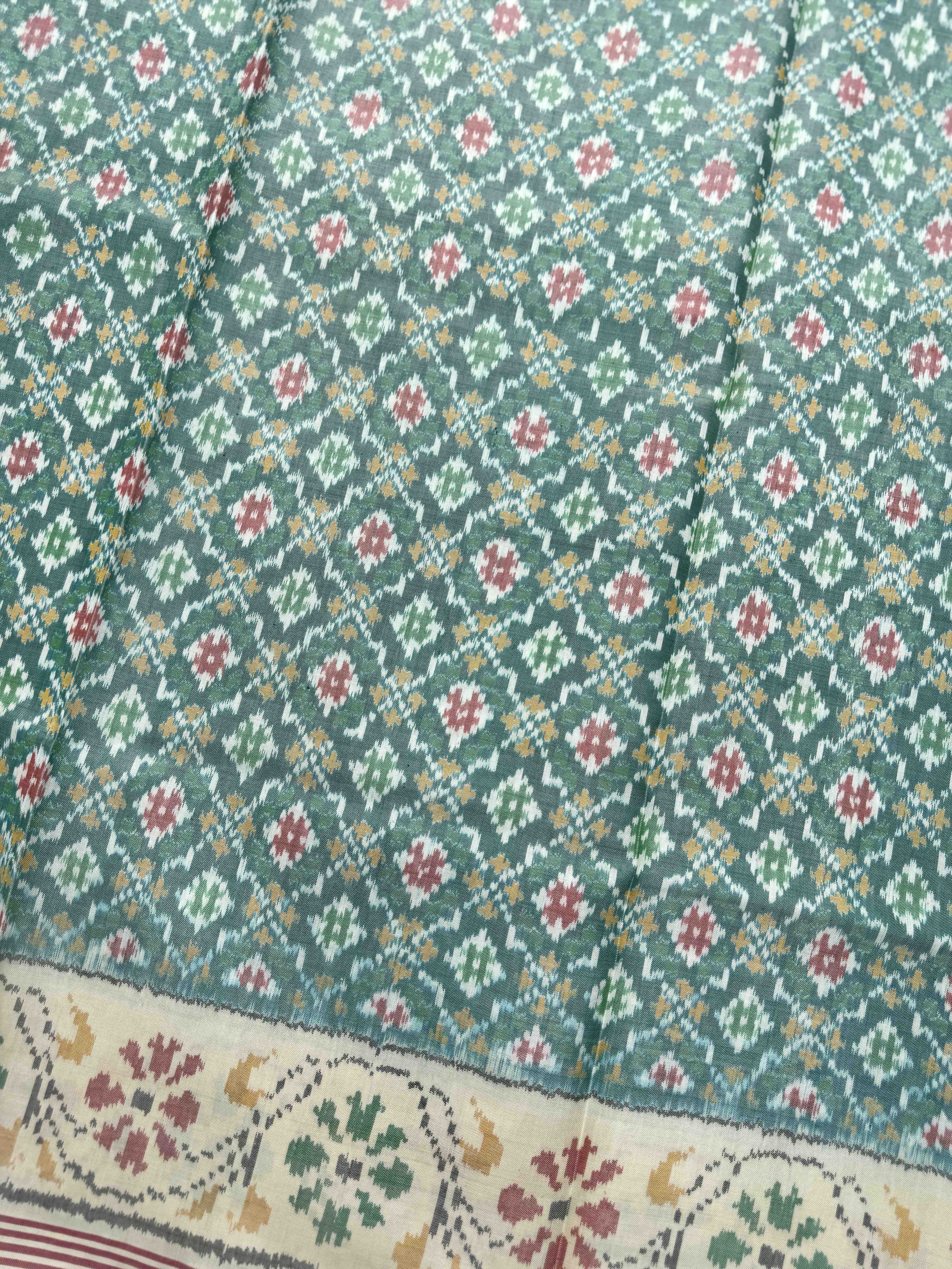 Off White & Sea Green Buttonful Single Ikat Patan Patola Saree