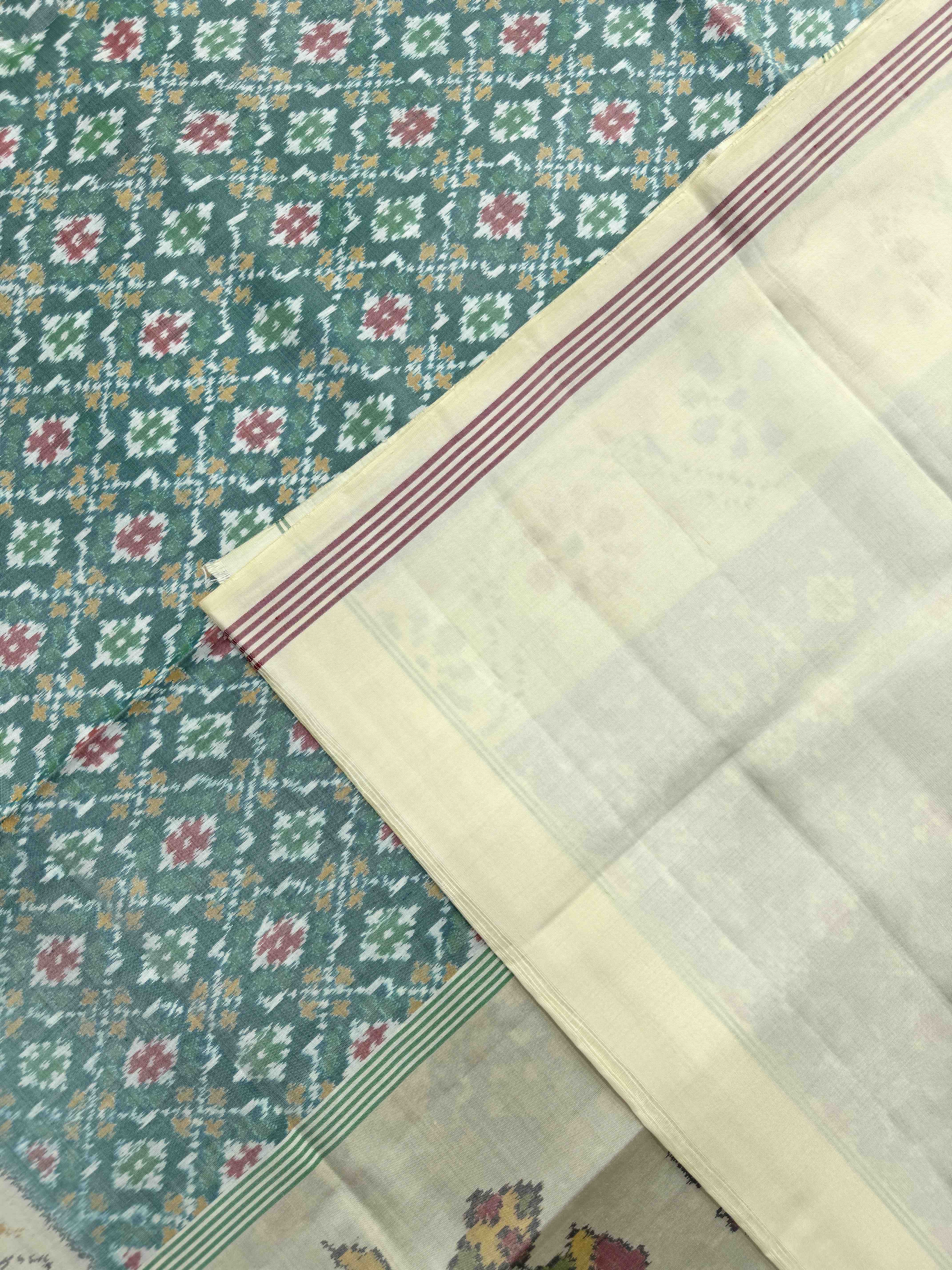 Off White & Sea Green Buttonful Single Ikat Patan Patola Saree