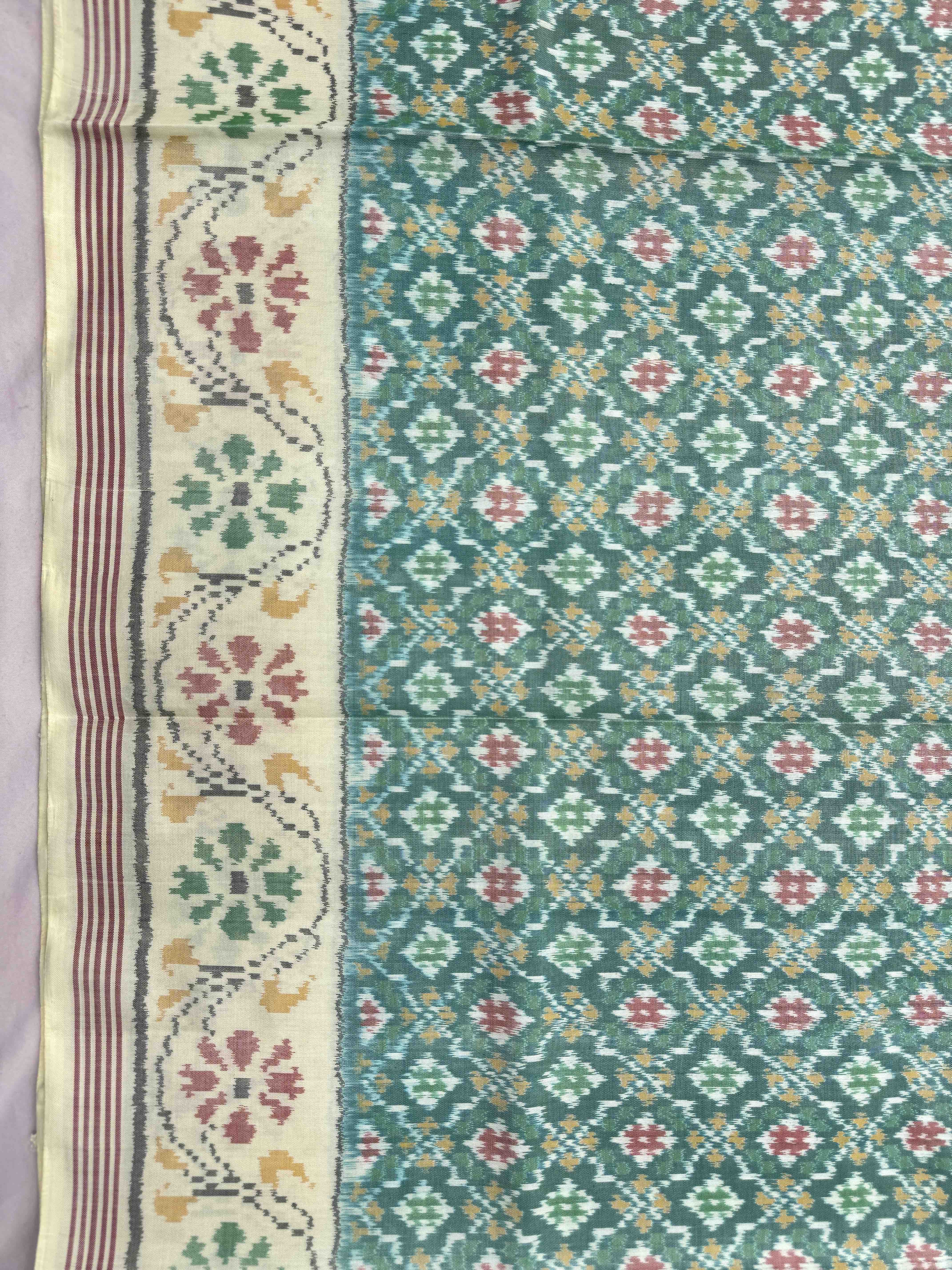 Off White & Light Green Buttonful Single Ikat Patan Patola Saree